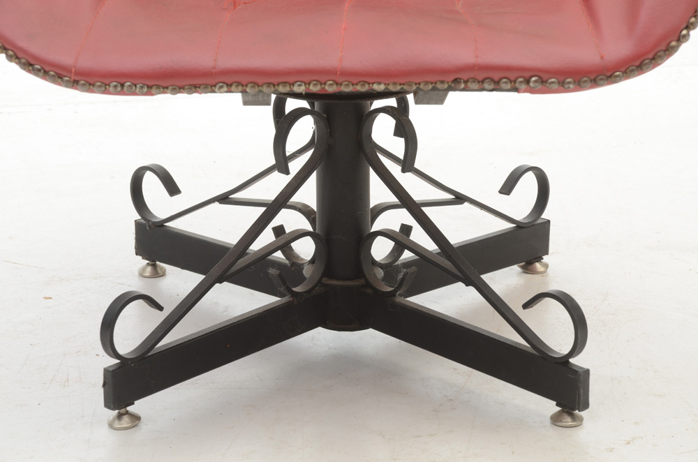 Pair of Red Vinyl Swivel Chairs