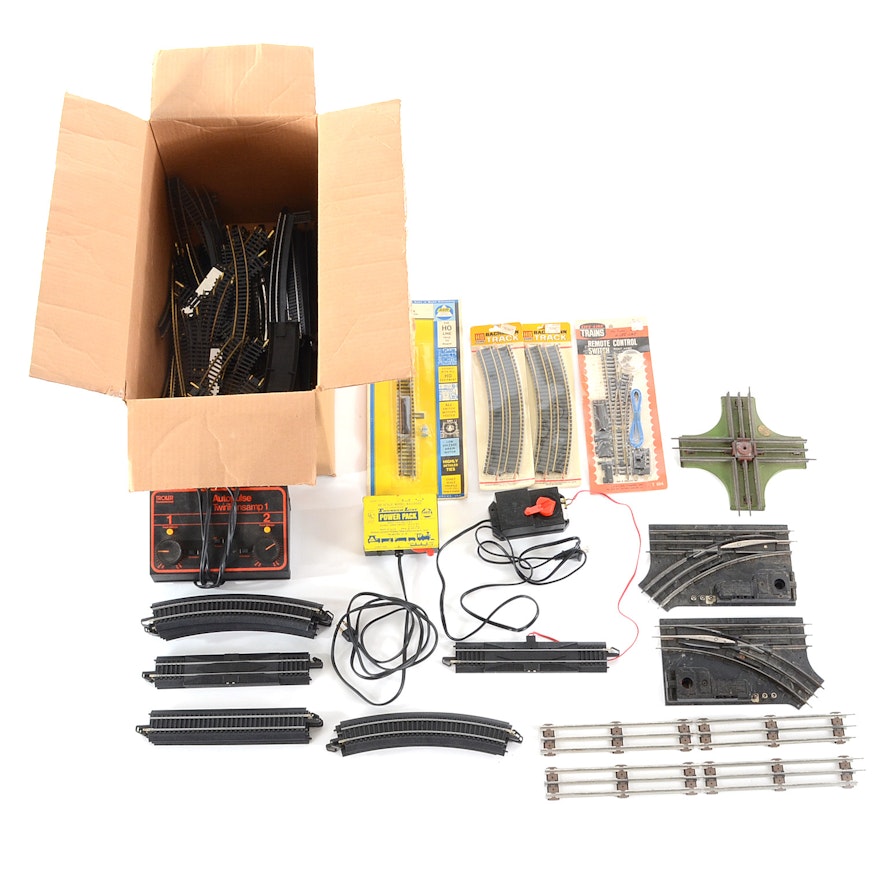 Collection of Model Train Tracks and Accessories