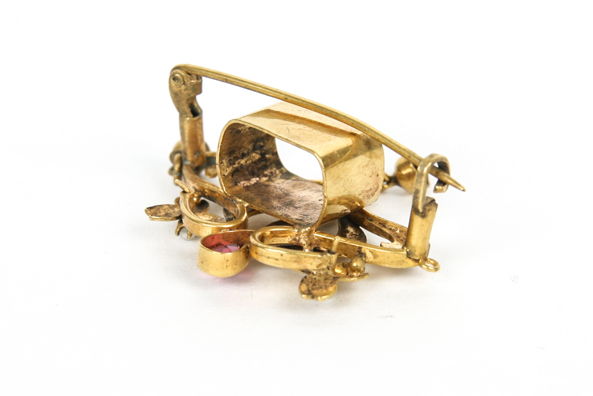 Gold Tone Costume Brooch with Synthetic Ruby