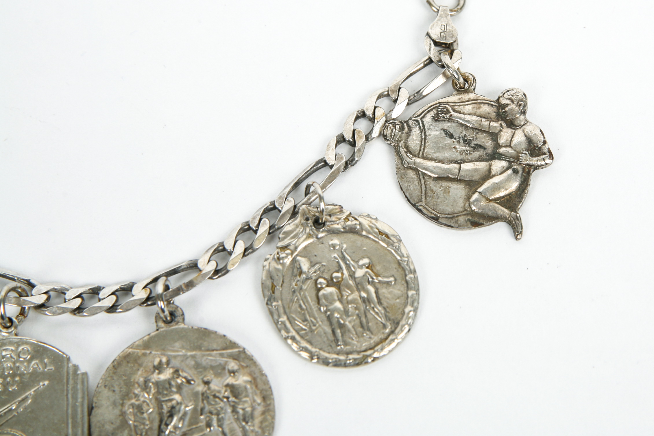 Sterling Silver Bracelet with Competitive Sport Charms