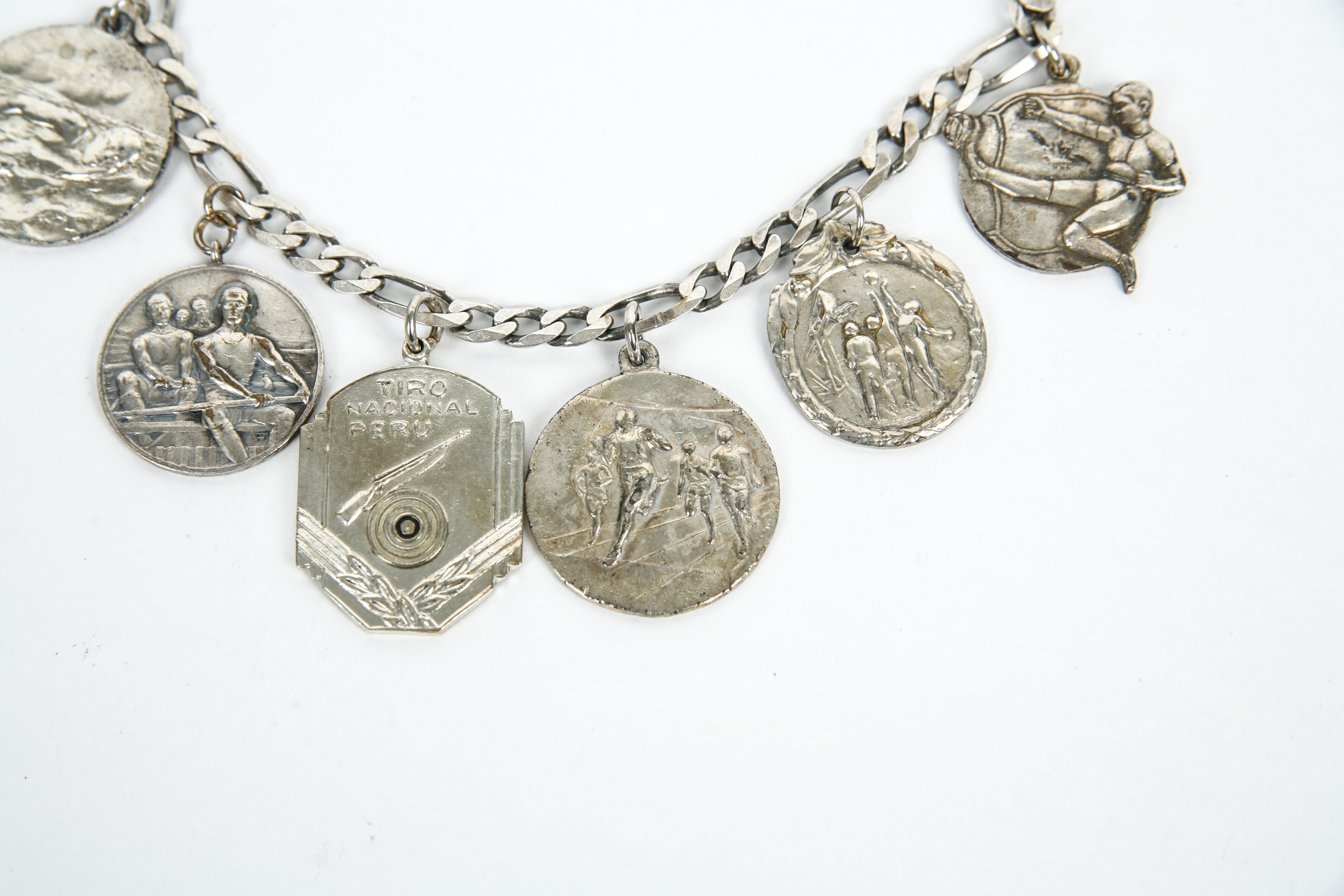 Sterling Silver Bracelet with Competitive Sport Charms