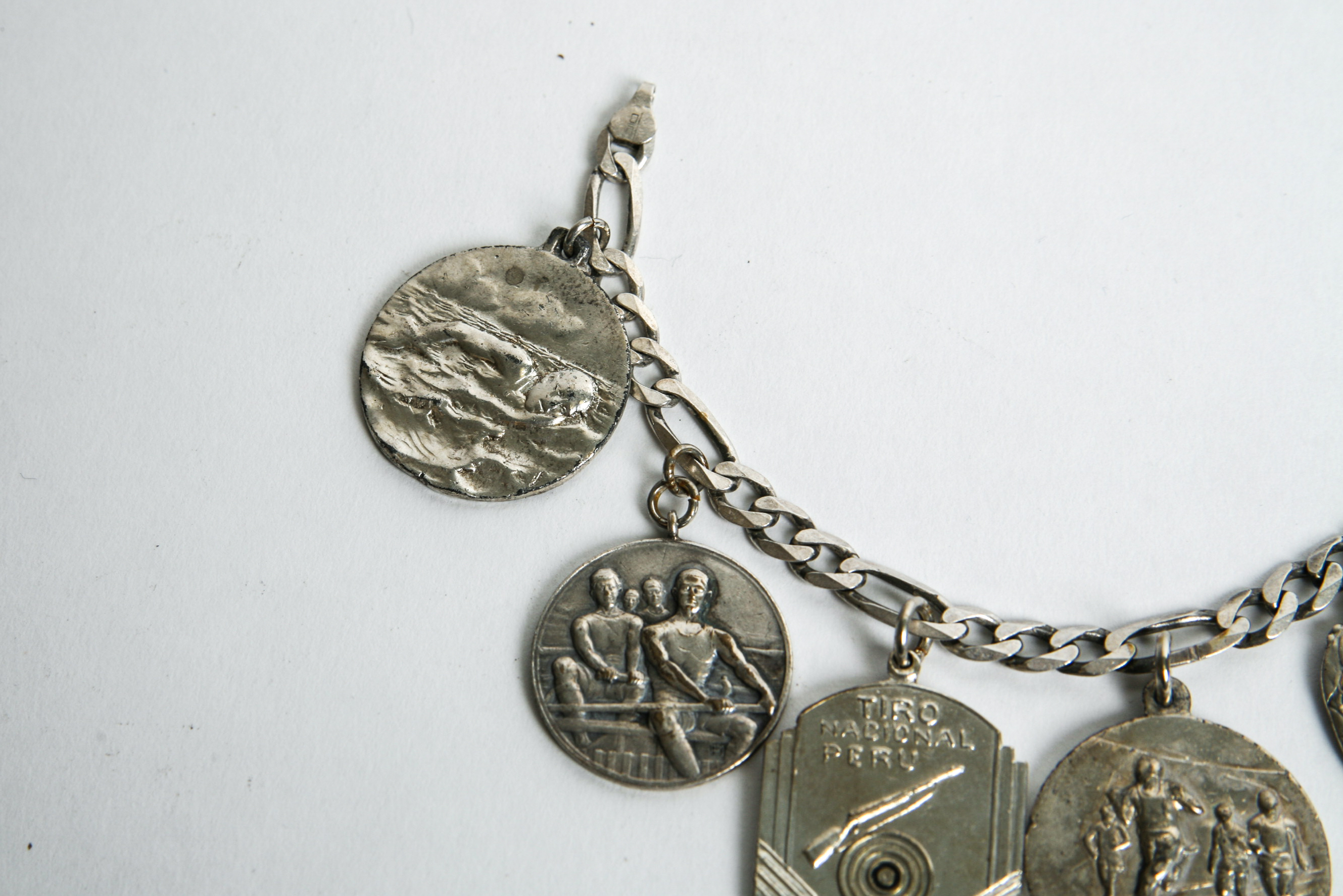 Sterling Silver Bracelet with Competitive Sport Charms