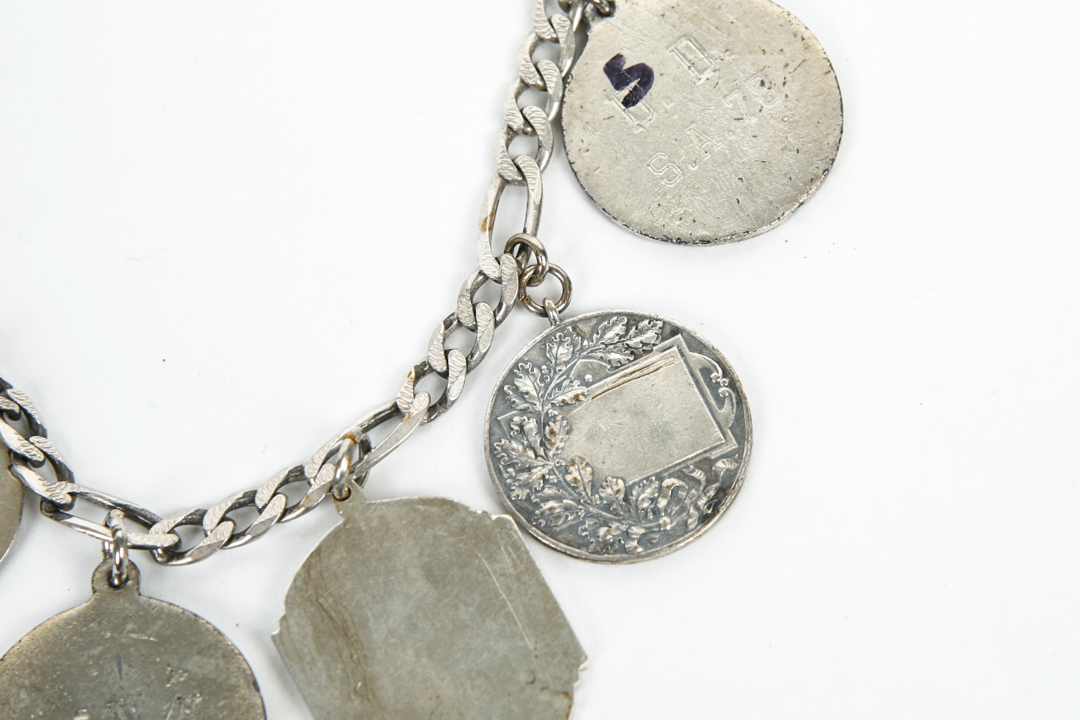 Sterling Silver Bracelet with Competitive Sport Charms