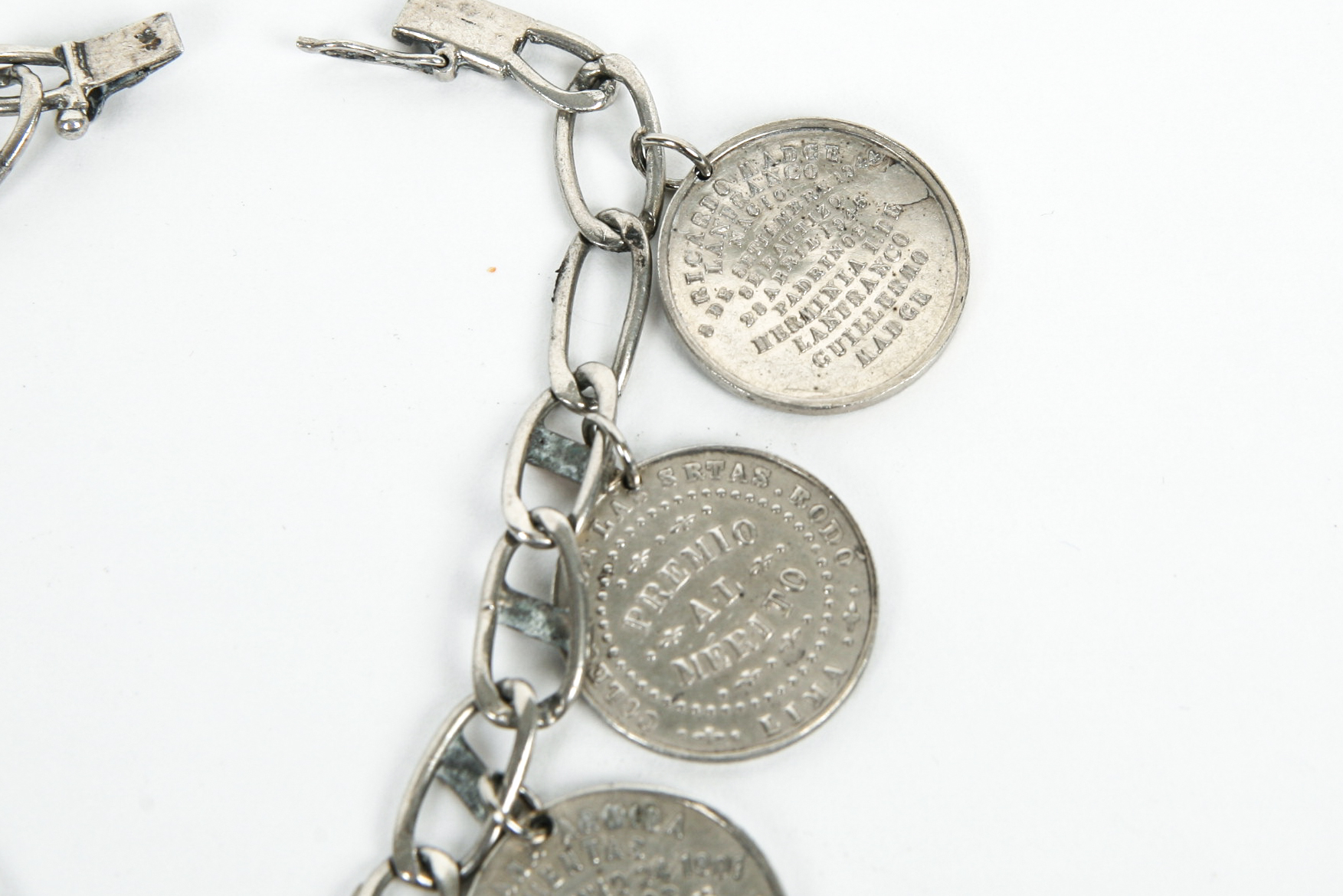 Sterling Silver Bracelet with Seven Antique Sterling Silver Baptismal Medals
