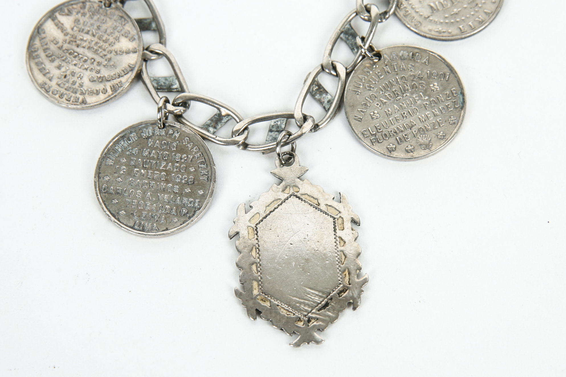 Sterling Silver Bracelet with Seven Antique Sterling Silver Baptismal Medals