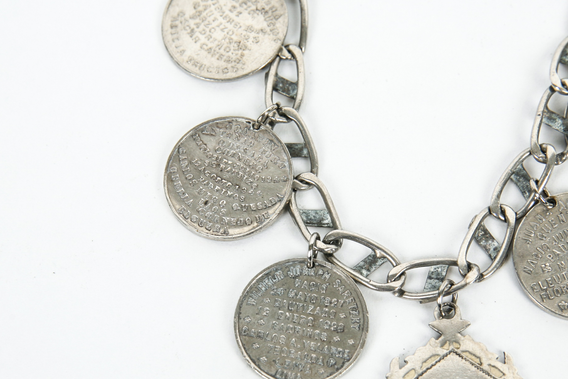 Sterling Silver Bracelet with Seven Antique Sterling Silver Baptismal Medals