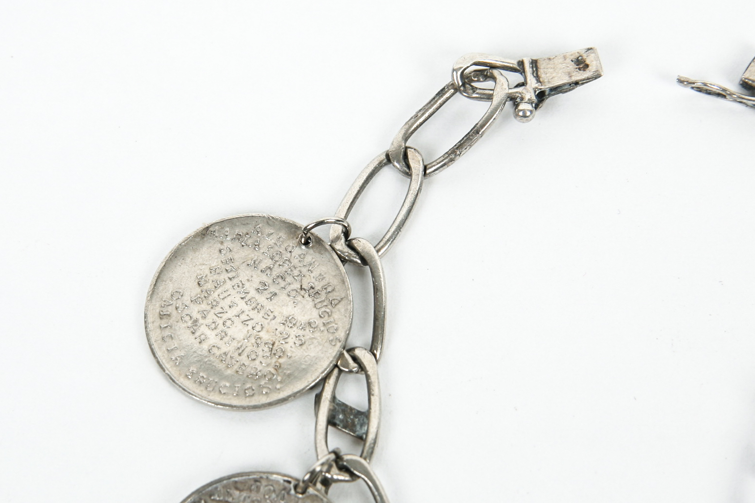 Sterling Silver Bracelet with Seven Antique Sterling Silver Baptismal Medals