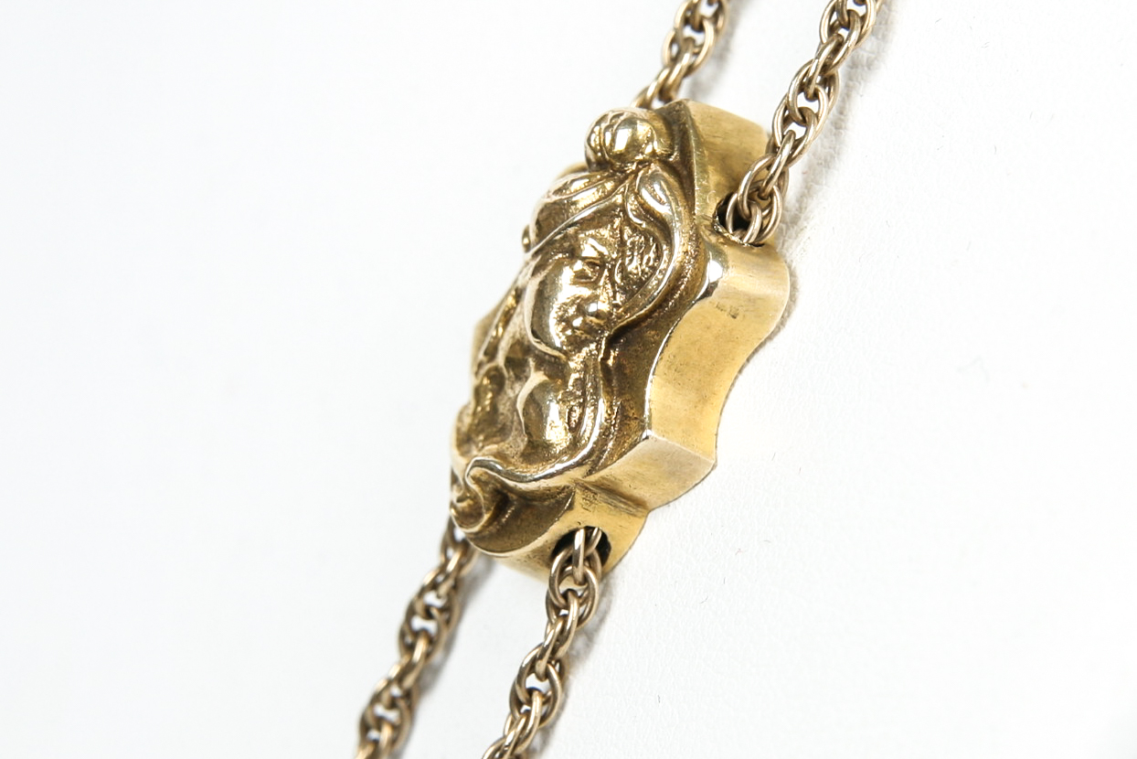 50 Inch Antique Gold Filled Watch Chain with 14K Gold Slide.