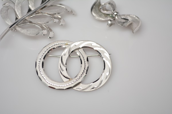 Three Brushed and Polished Sterling Silver Brooches
