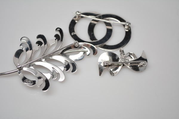 Three Brushed and Polished Sterling Silver Brooches