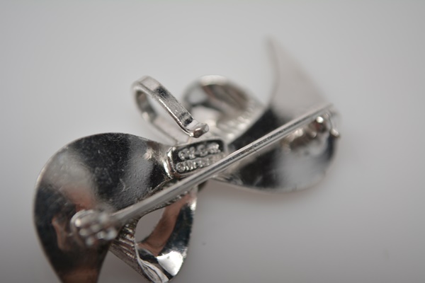 Three Brushed and Polished Sterling Silver Brooches