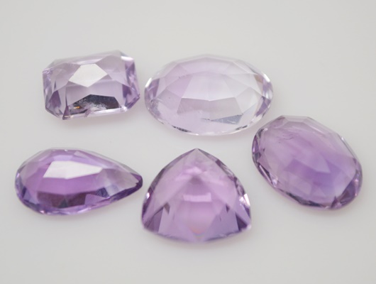 Five Loose 30.56 CTW Natural Amethyst Gemstones