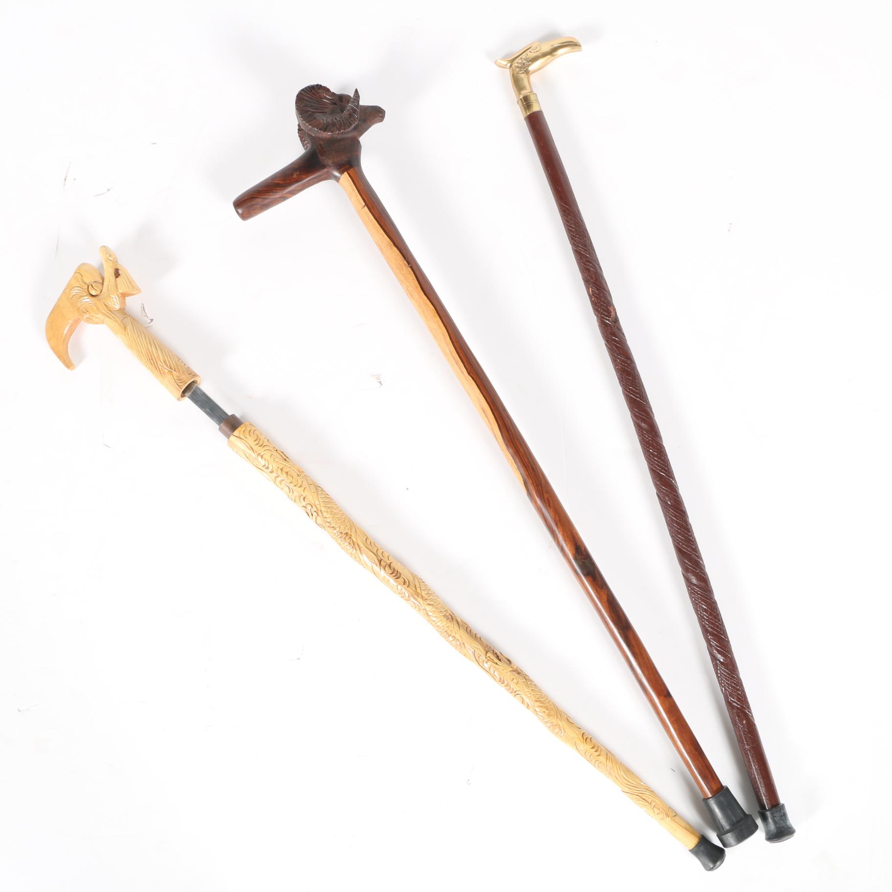 Wooden and Metallic Canes Including Sword Cane