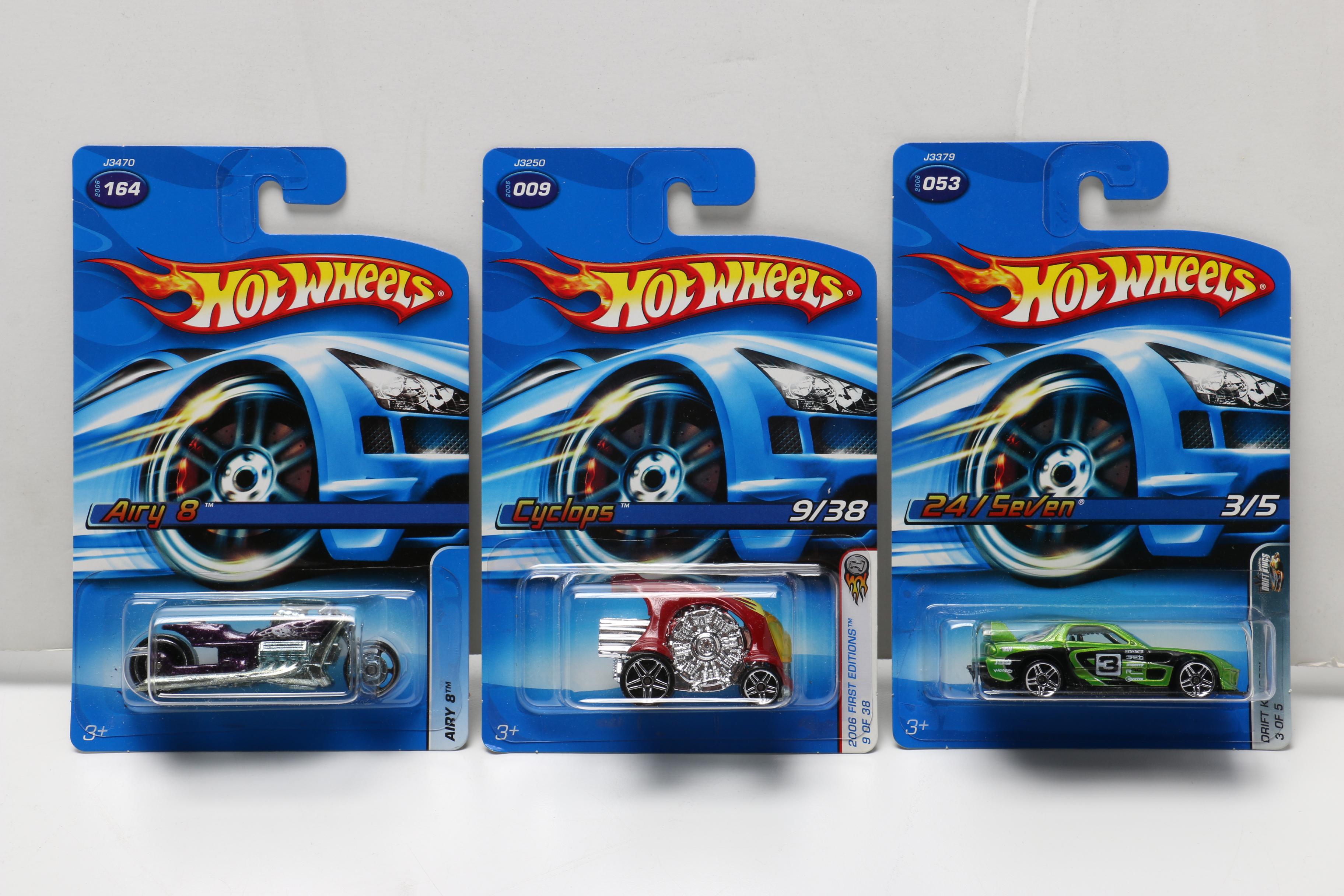 Hot Wheels Cars Including WWE Series and Batmobile