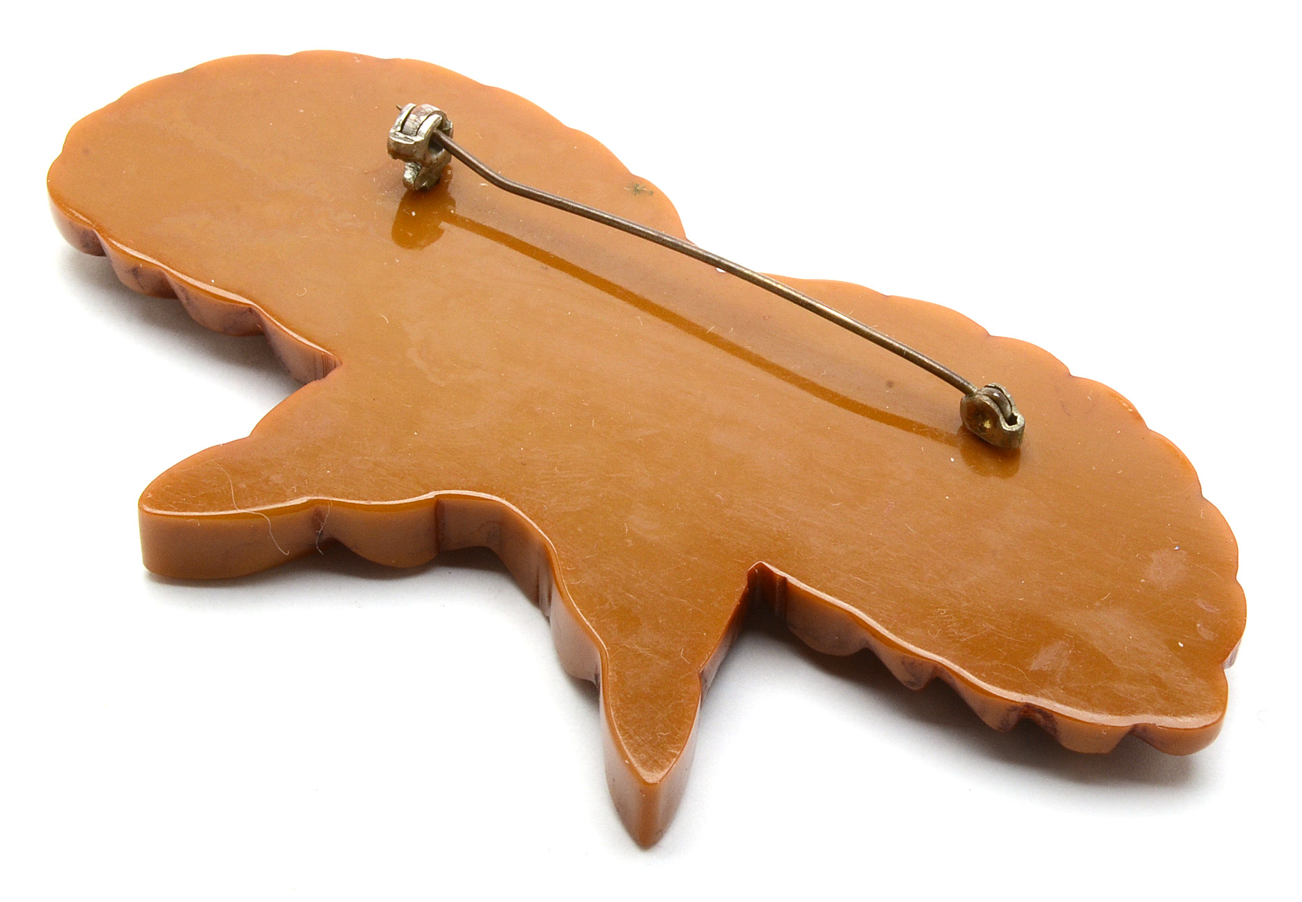 Carved Bakelite Brooches