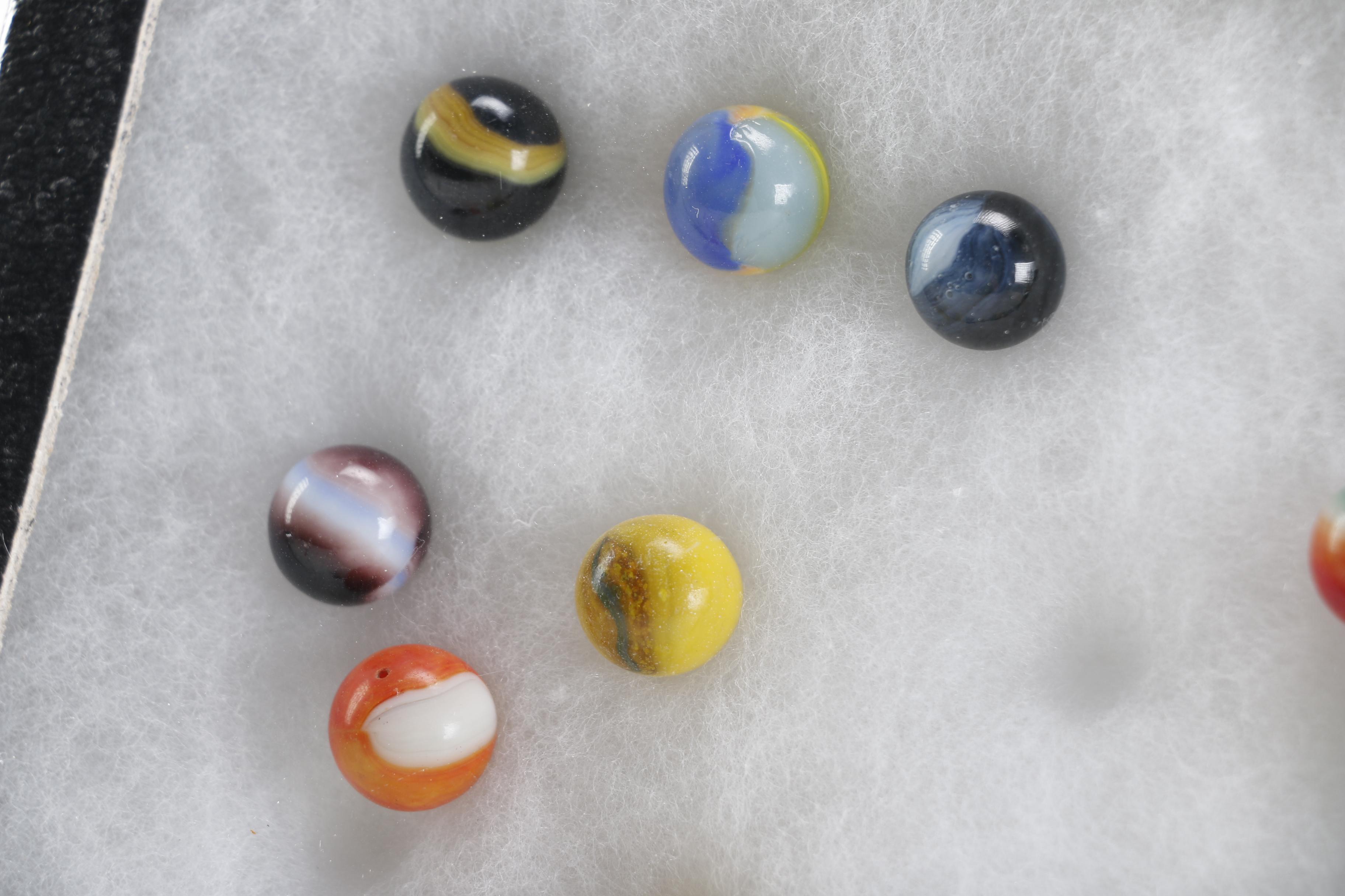 Cases of Shooters and Marbles