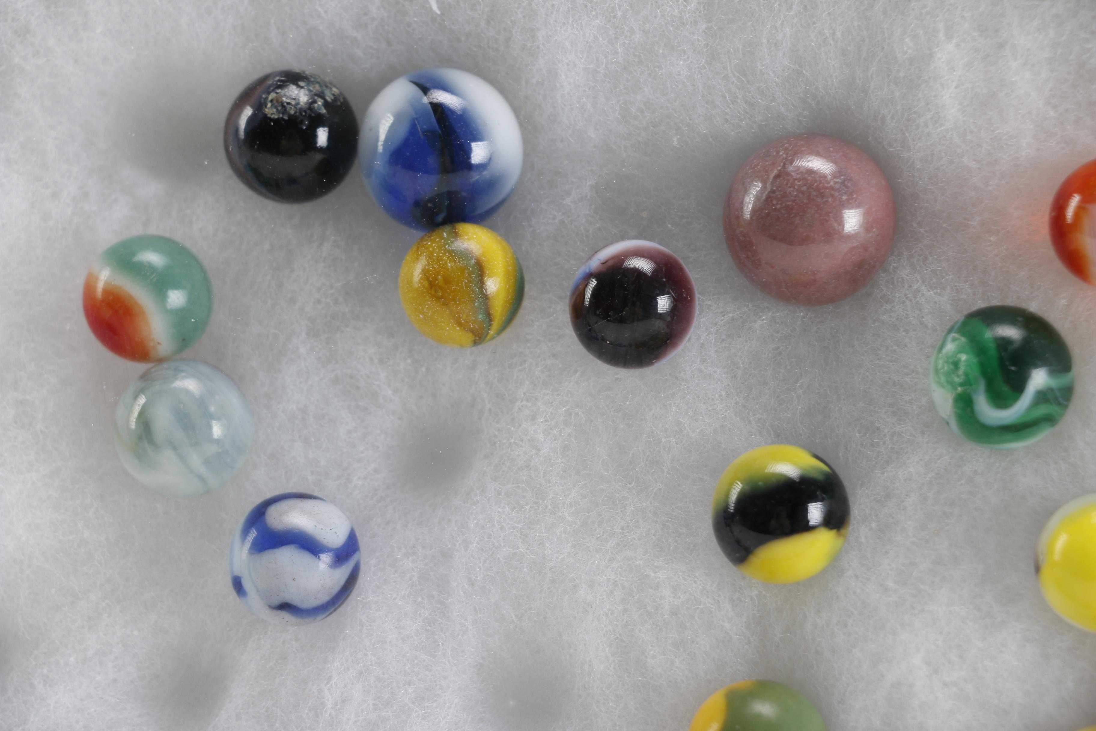 Cases of Shooters and Marbles