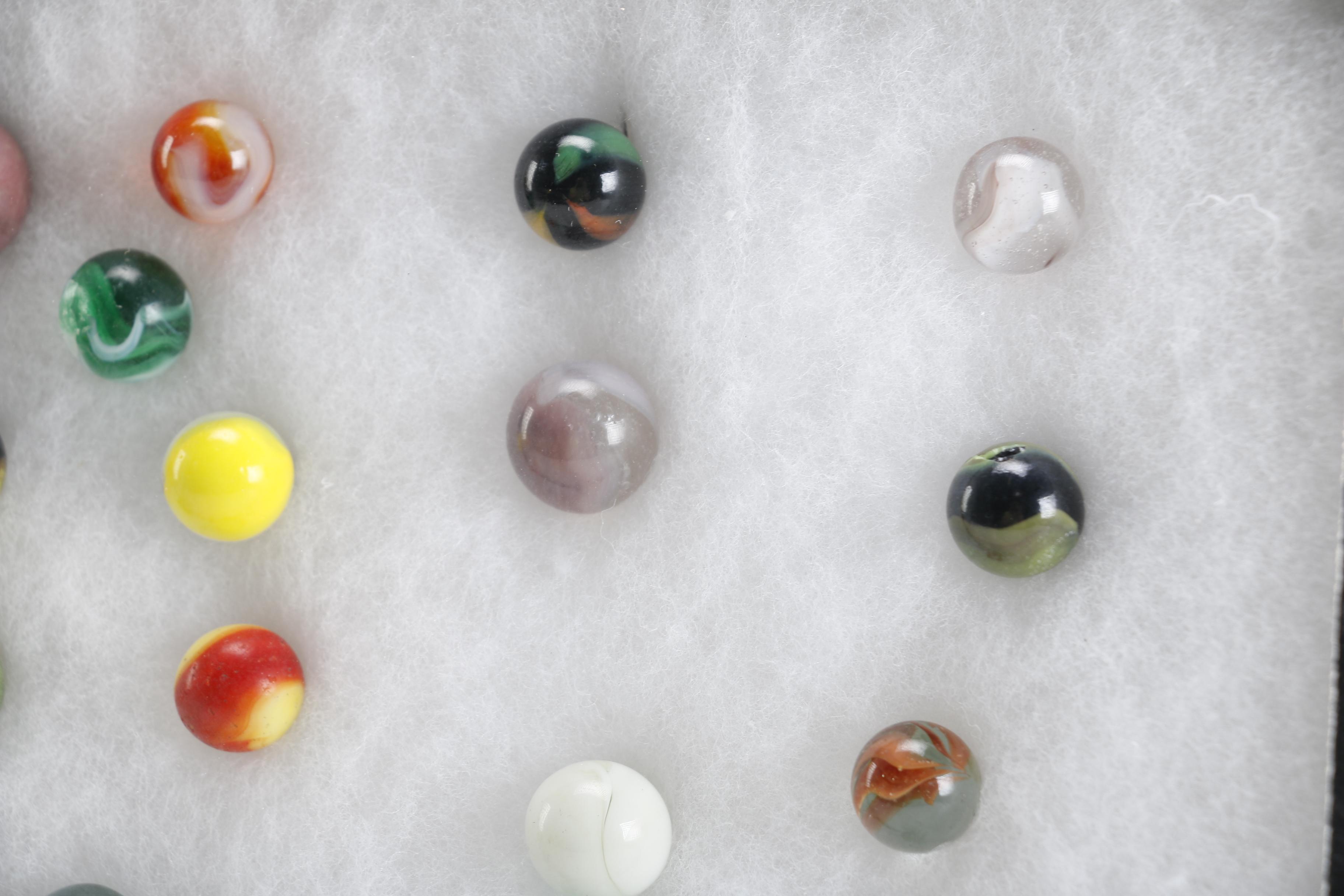 Cases of Shooters and Marbles