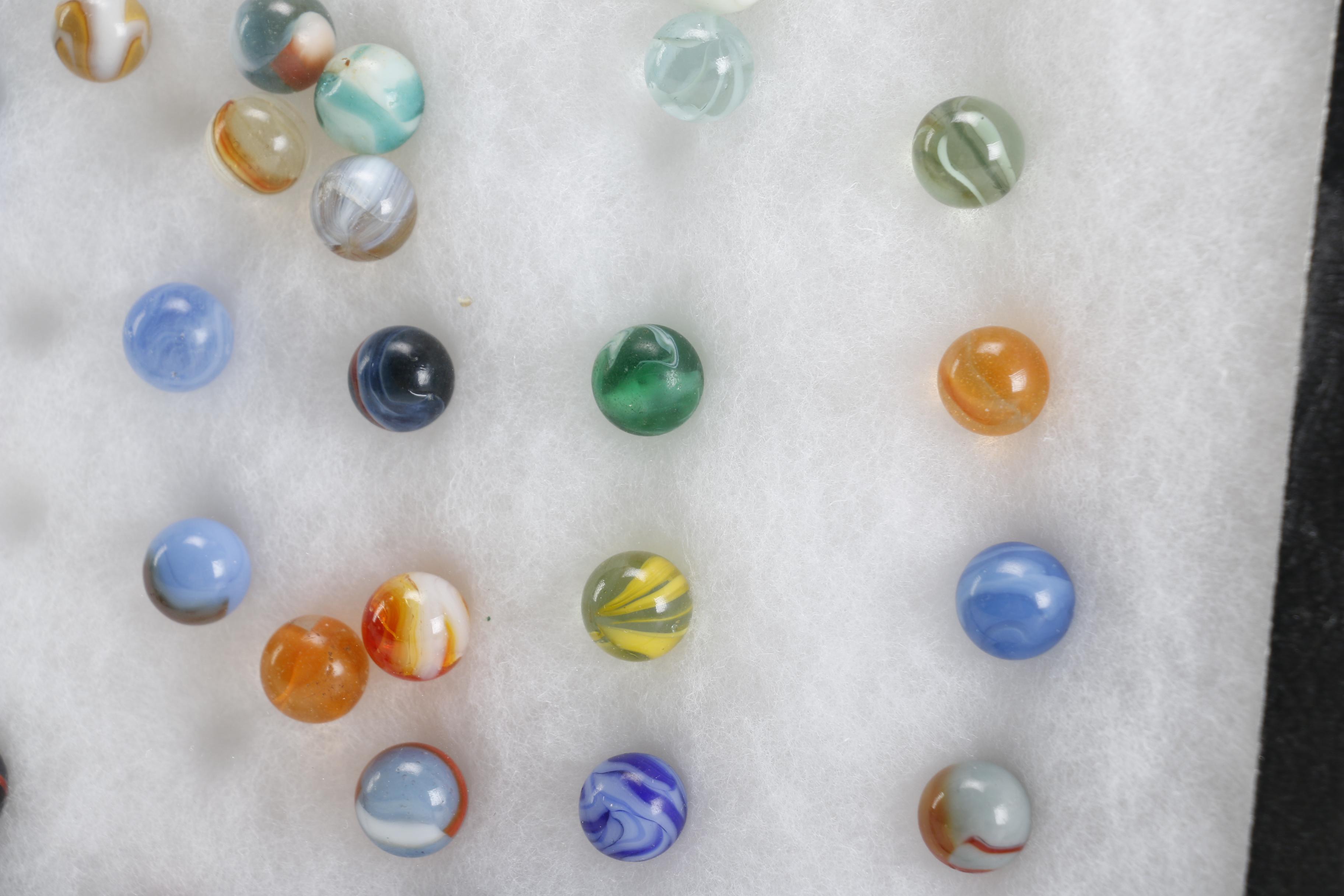 Cases of Shooters and Marbles