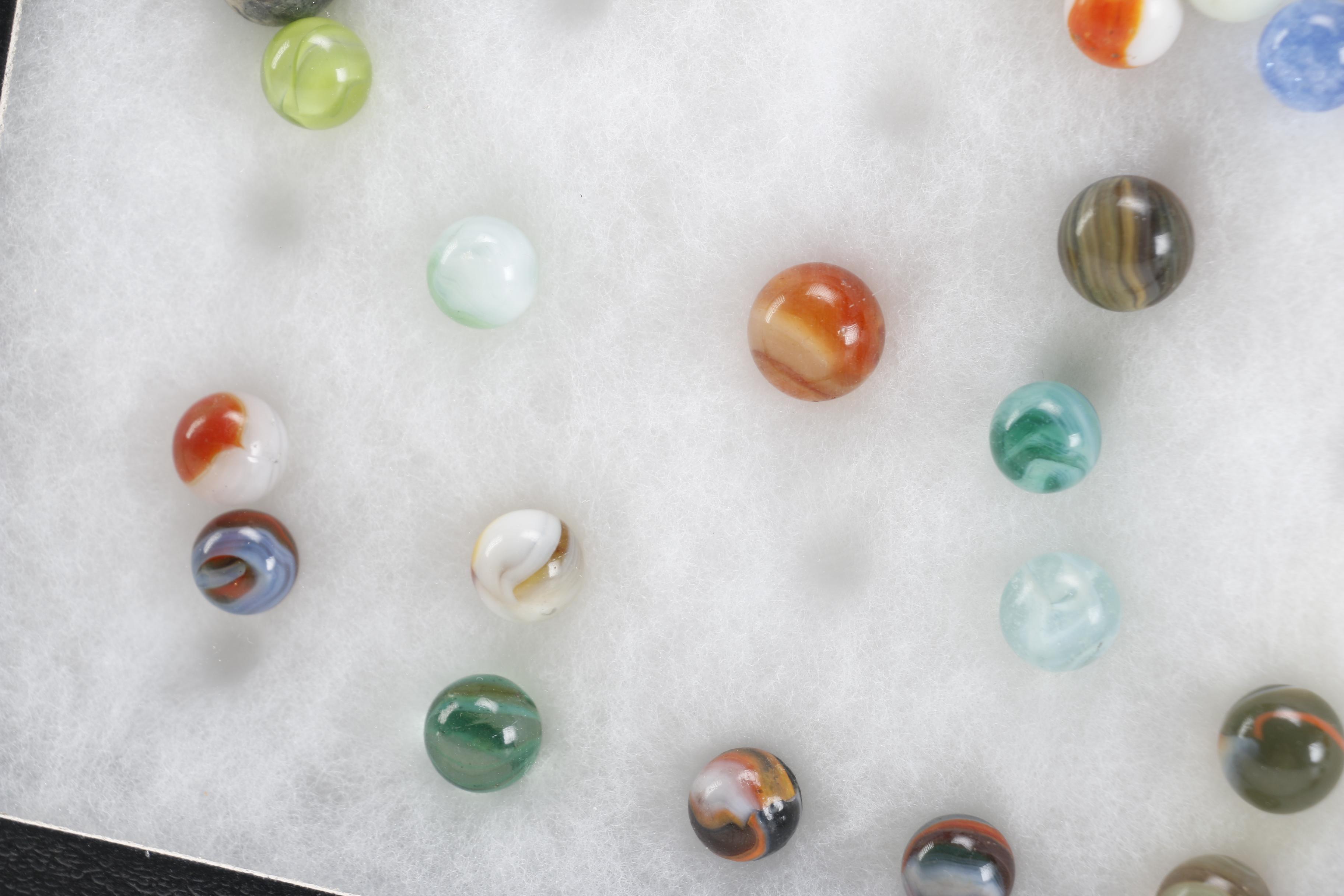 Cases of Shooters and Marbles
