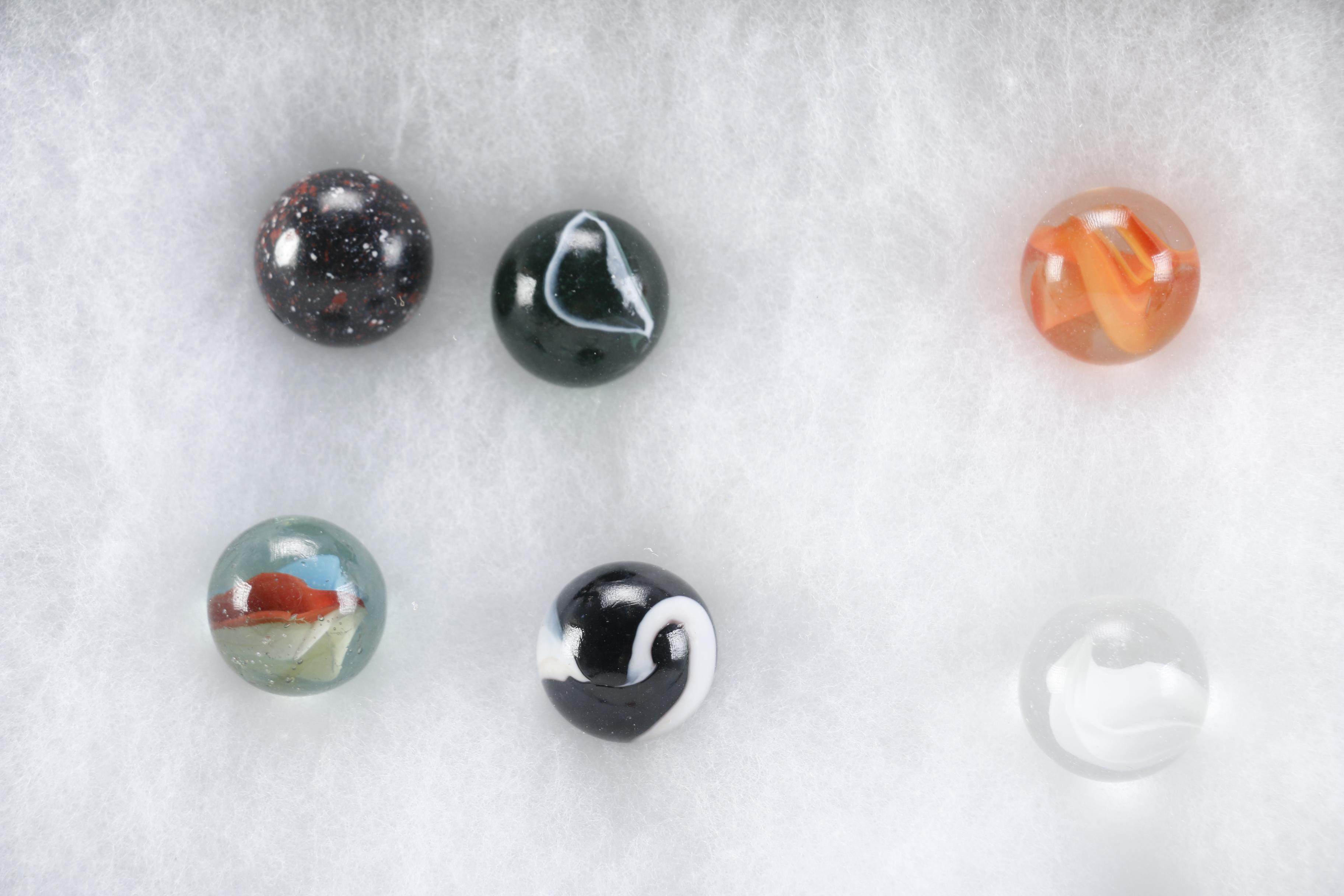 Cases of Shooters and Marbles
