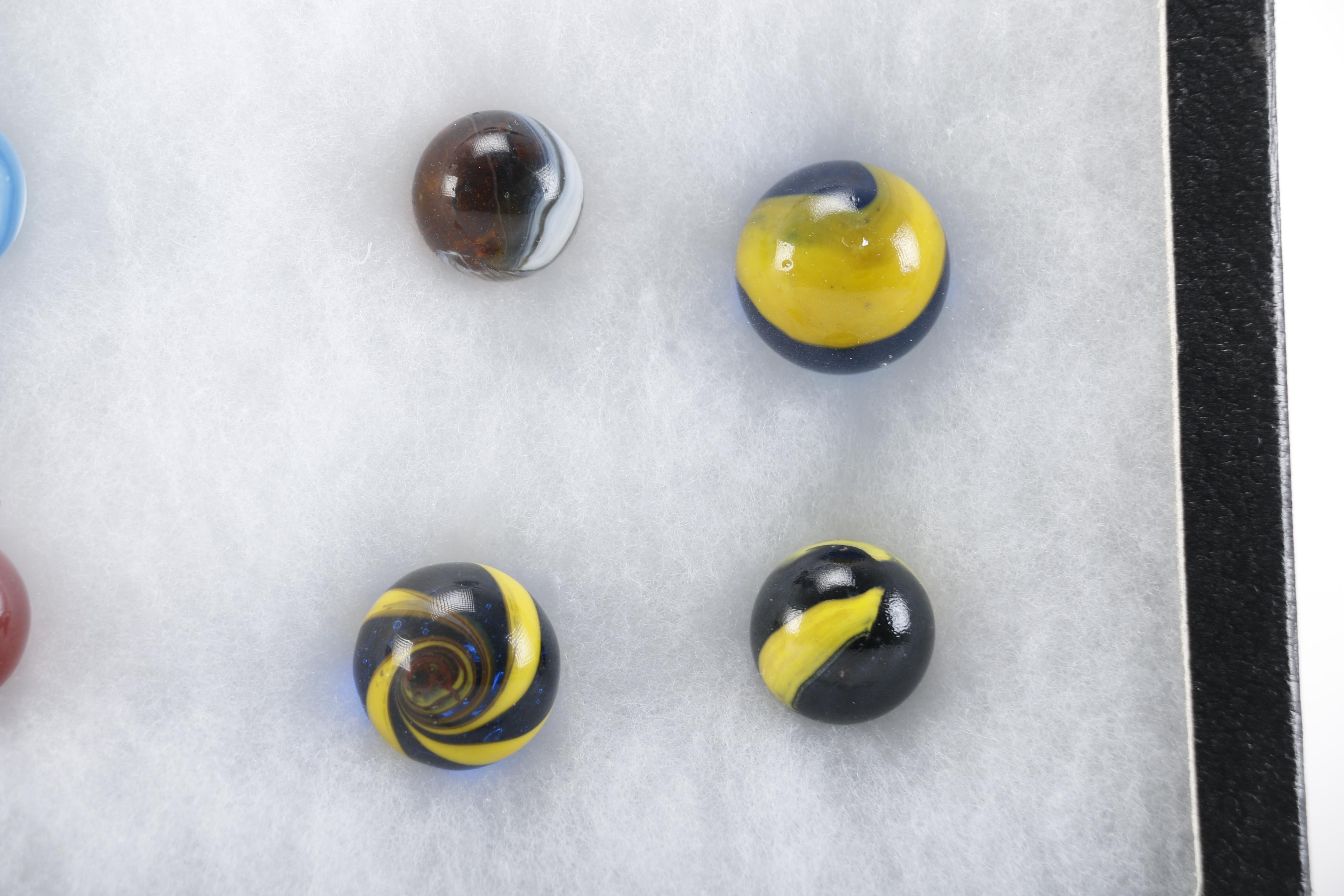 Cases of Shooters and Marbles