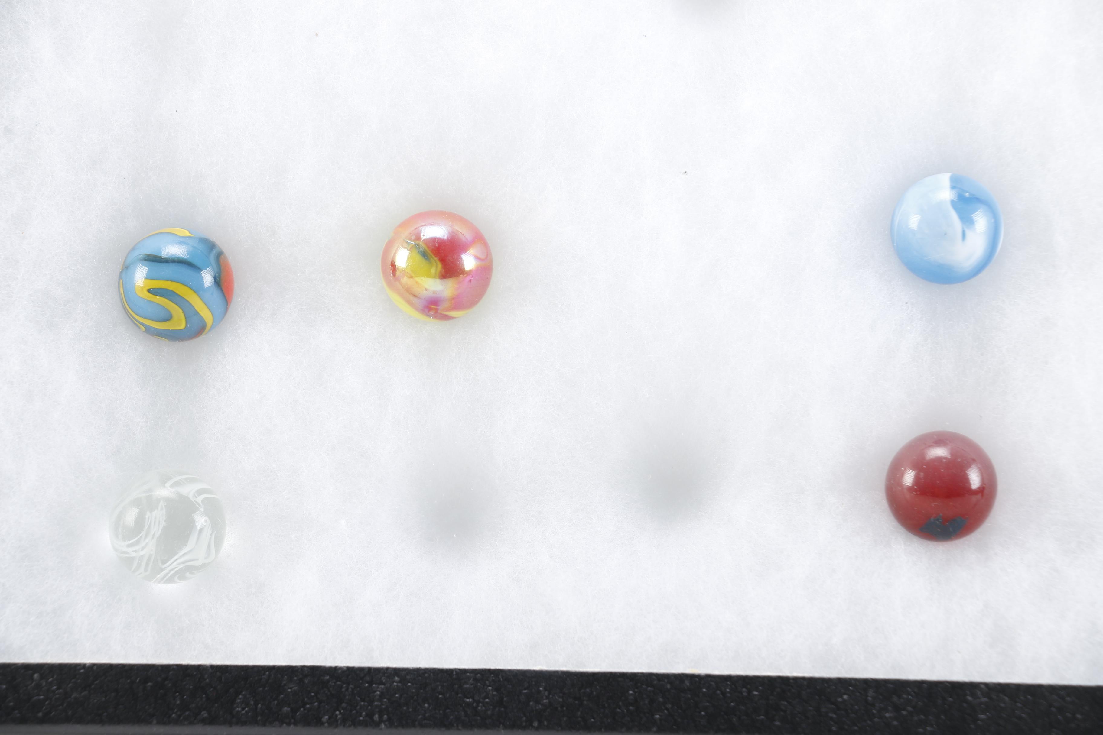 Cases of Shooters and Marbles