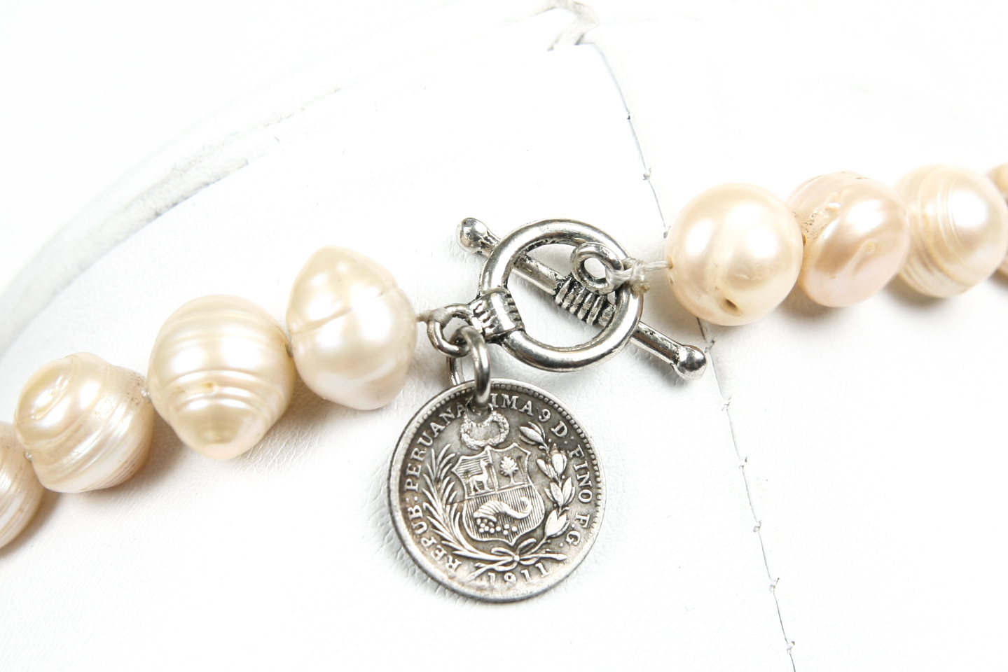 Pearl Necklace with Sports Medallions
