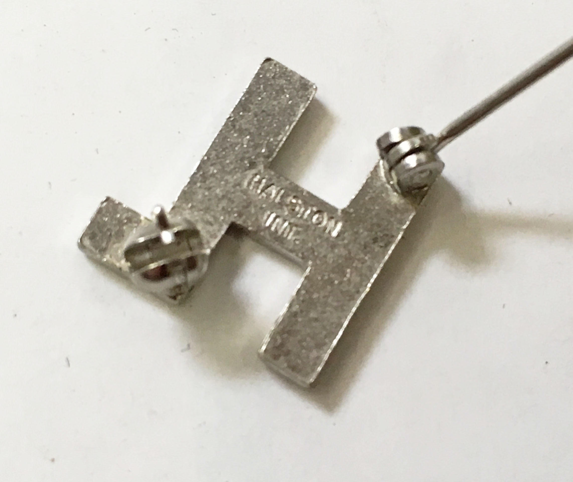Halston 'H' Pin