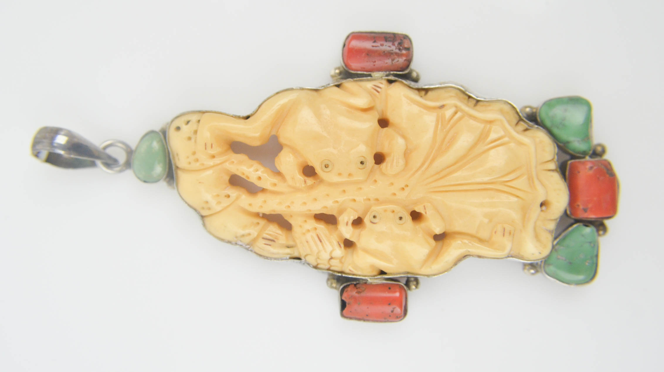 Sterling Silver Pendant with Bone, Coral , and Turquoise