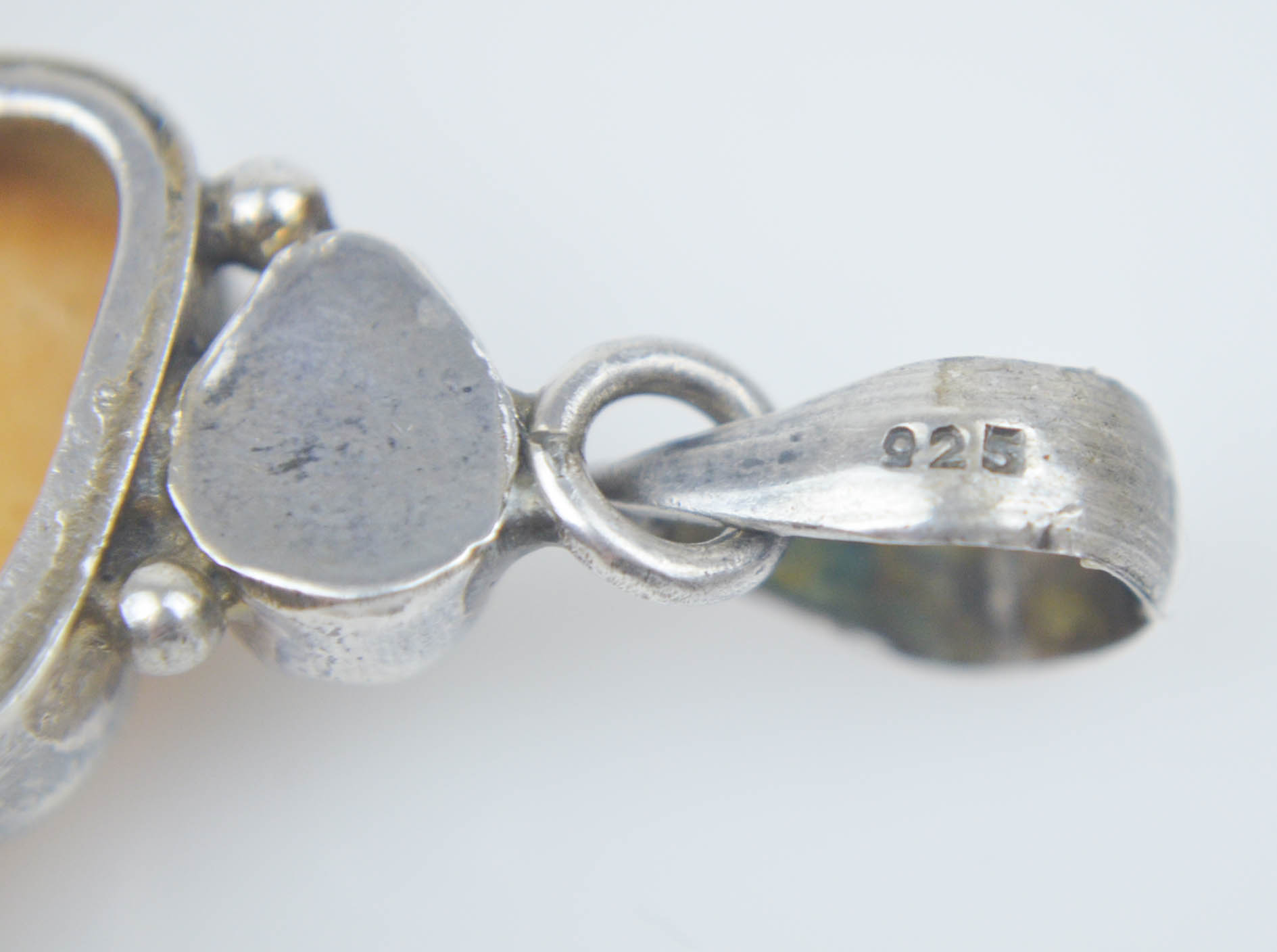 Sterling Silver Pendant with Bone, Coral , and Turquoise