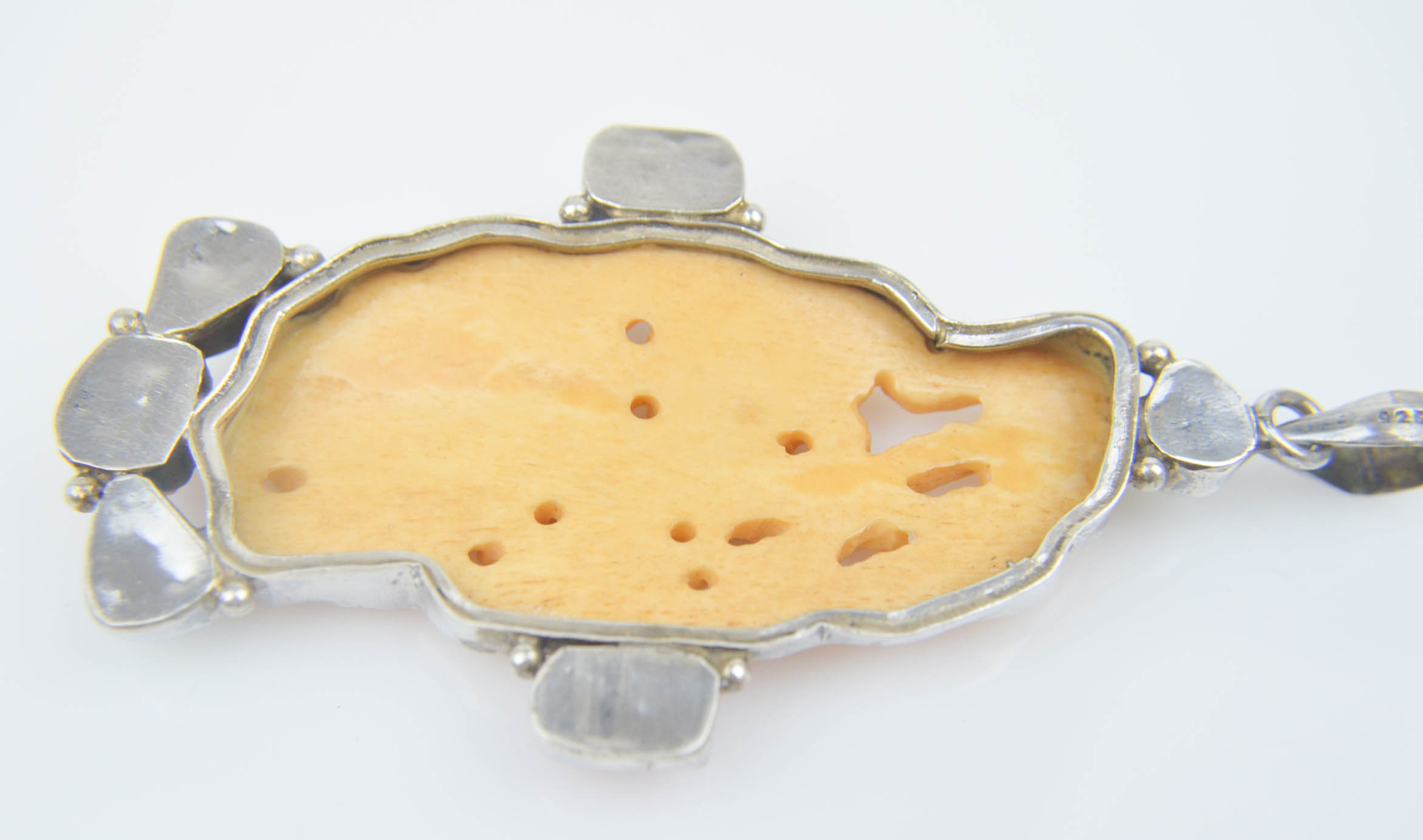 Sterling Silver Pendant with Bone, Coral , and Turquoise