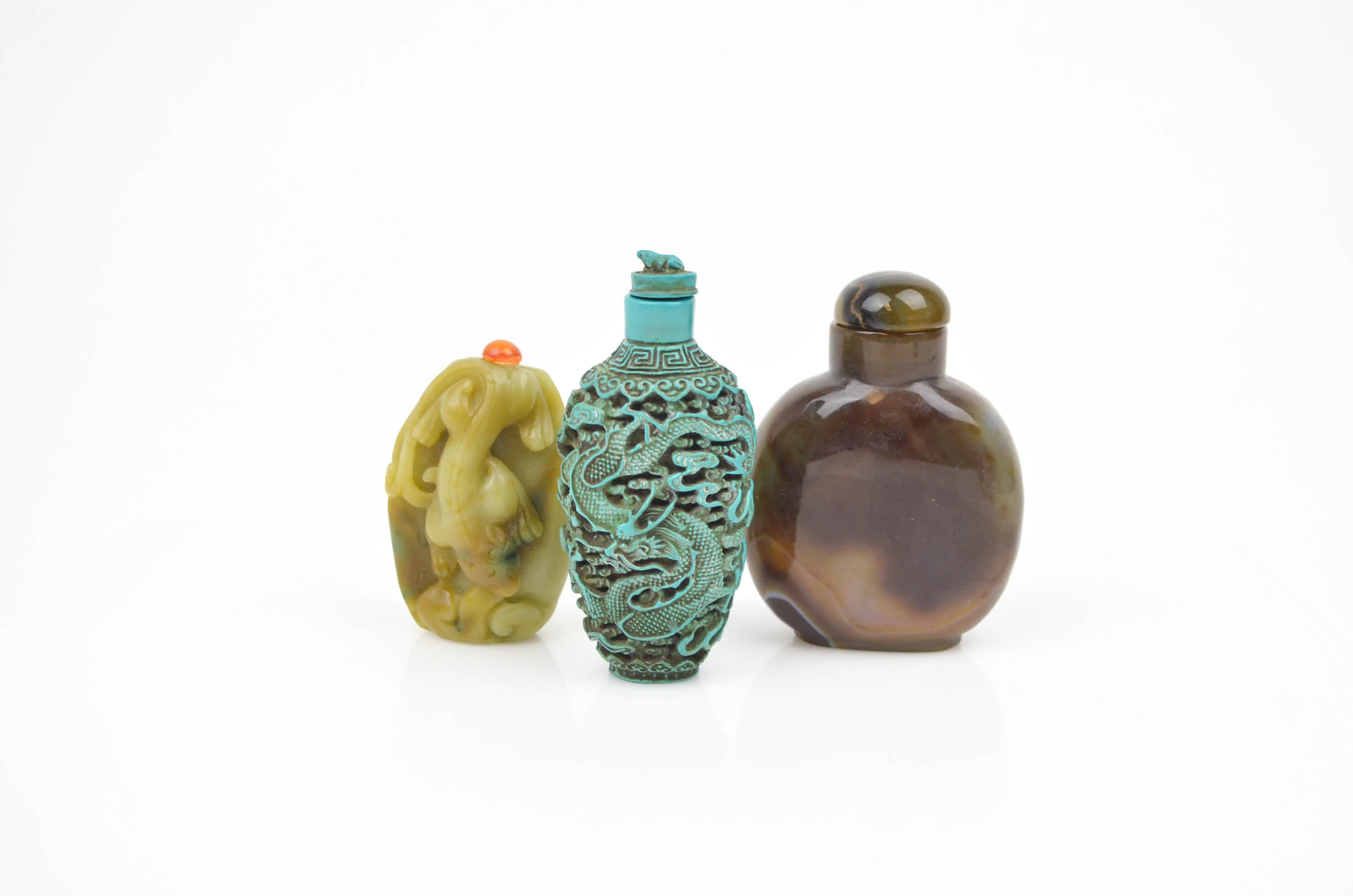 Three Polished Stone Chinese Snuff Bottles