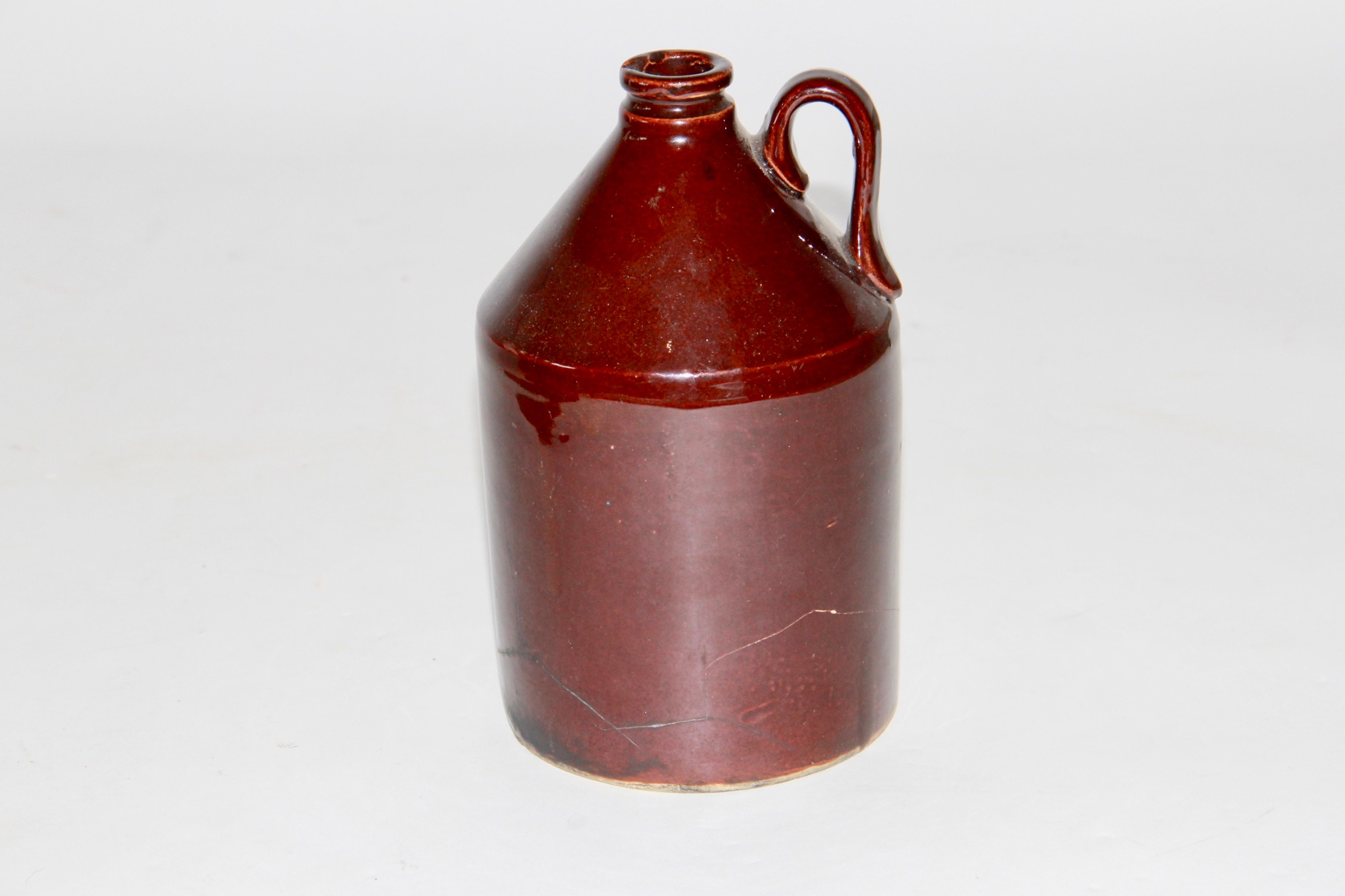 Pair of Vintage Ceramic Whiskey Jugs