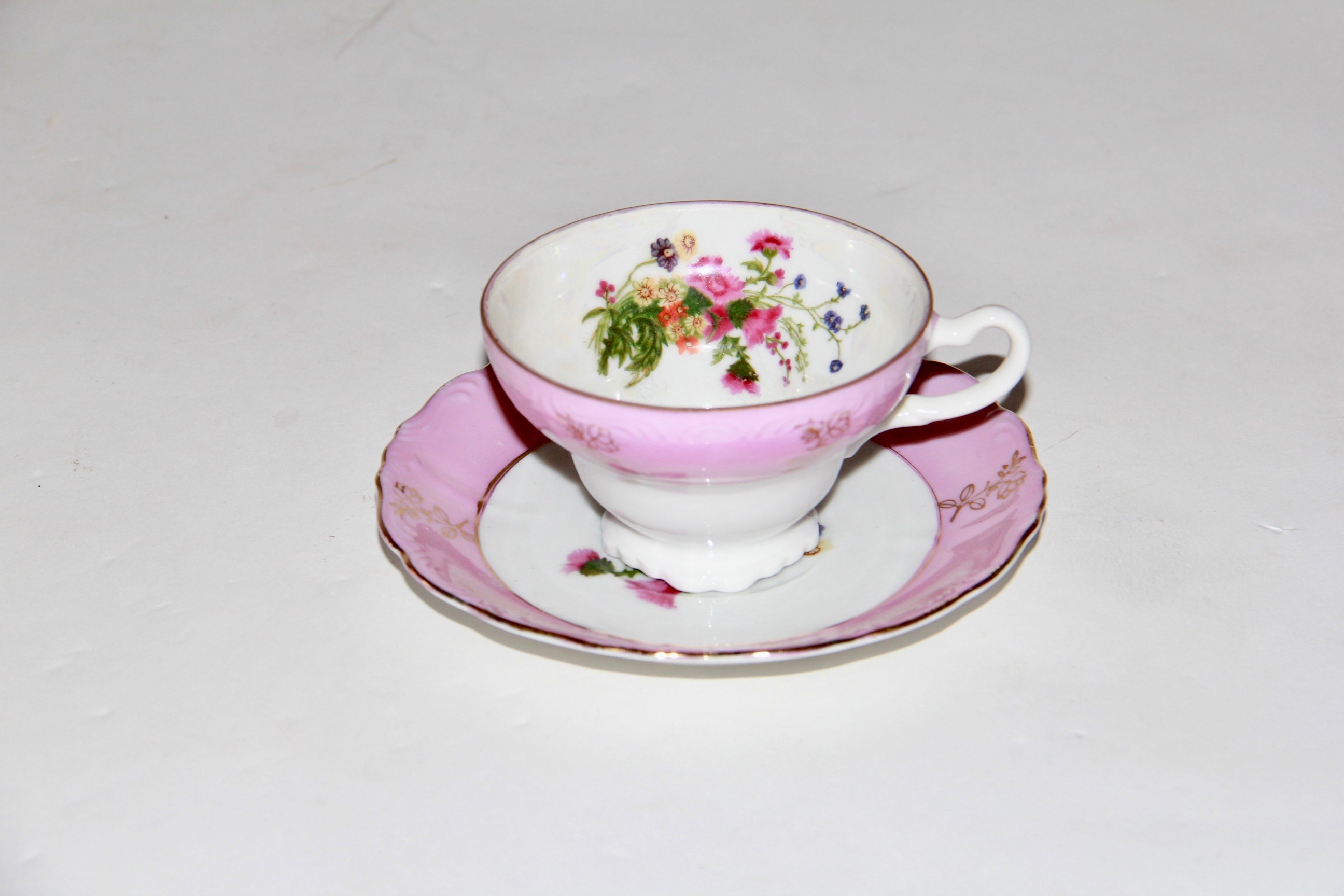 Porcelain Teacups and Saucers Including Paragon
