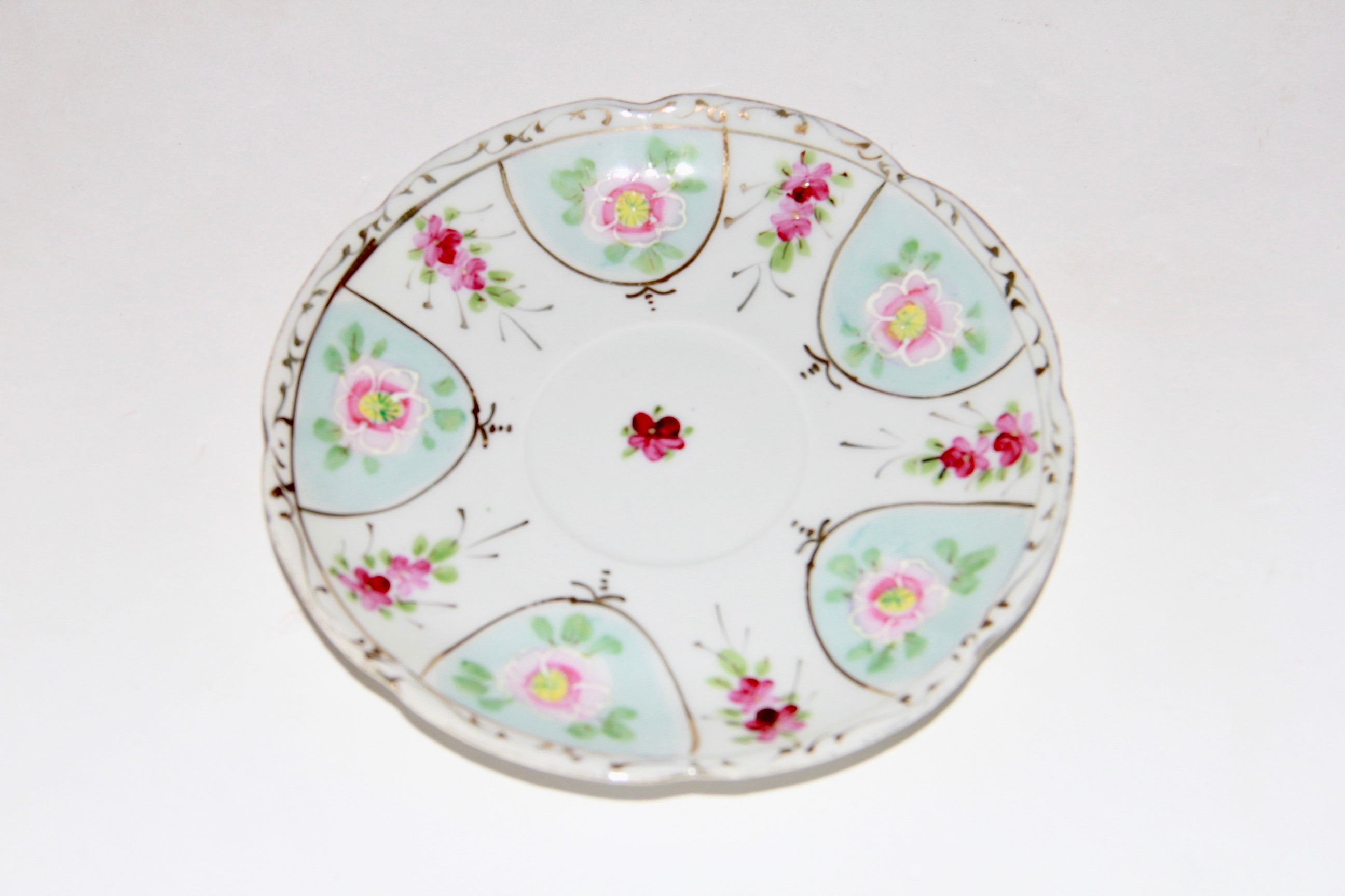 Porcelain Teacups and Saucers Including Paragon