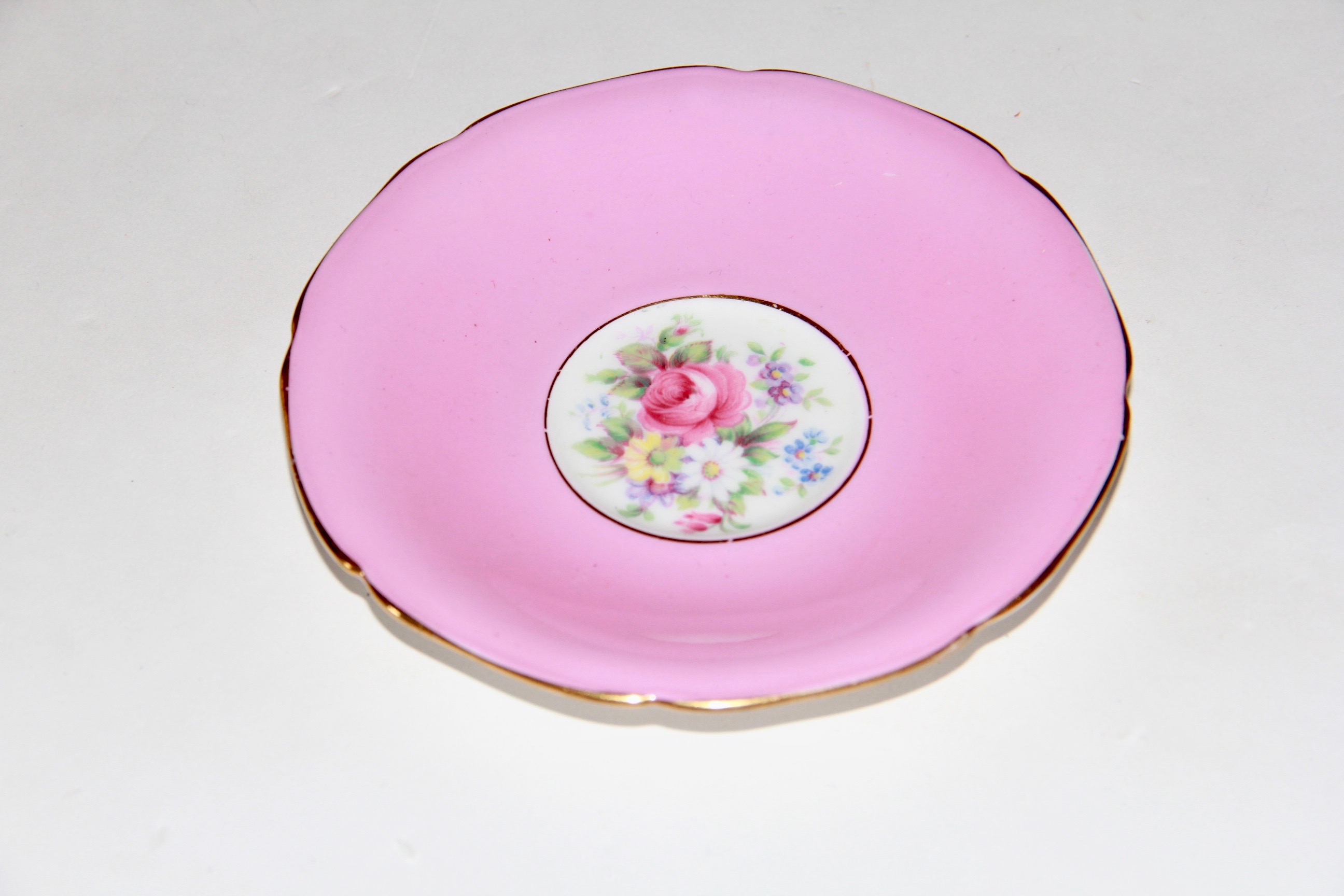 Porcelain Teacups and Saucers Including Paragon