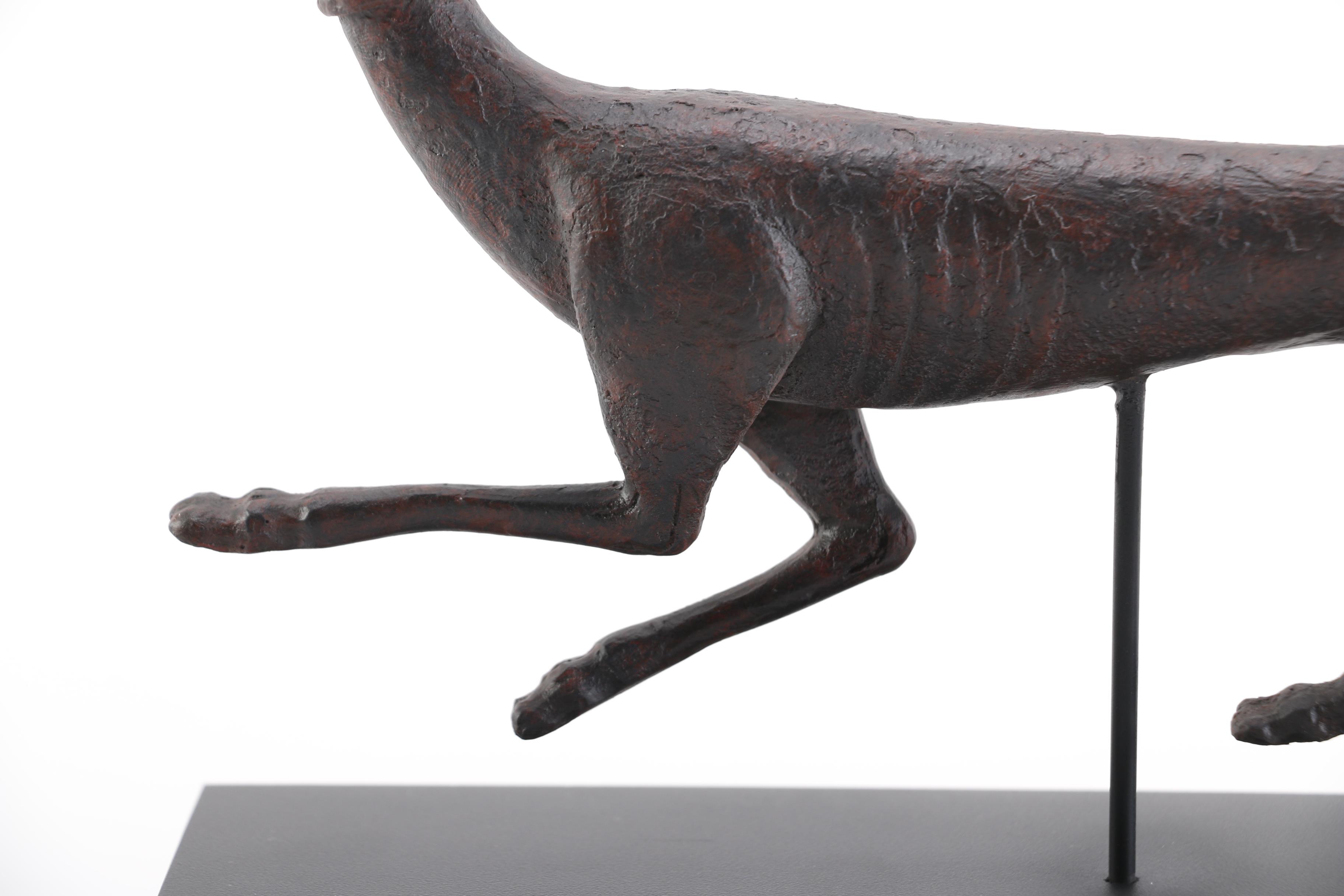 Cast Plaster Sculpture of a Running Greyhound