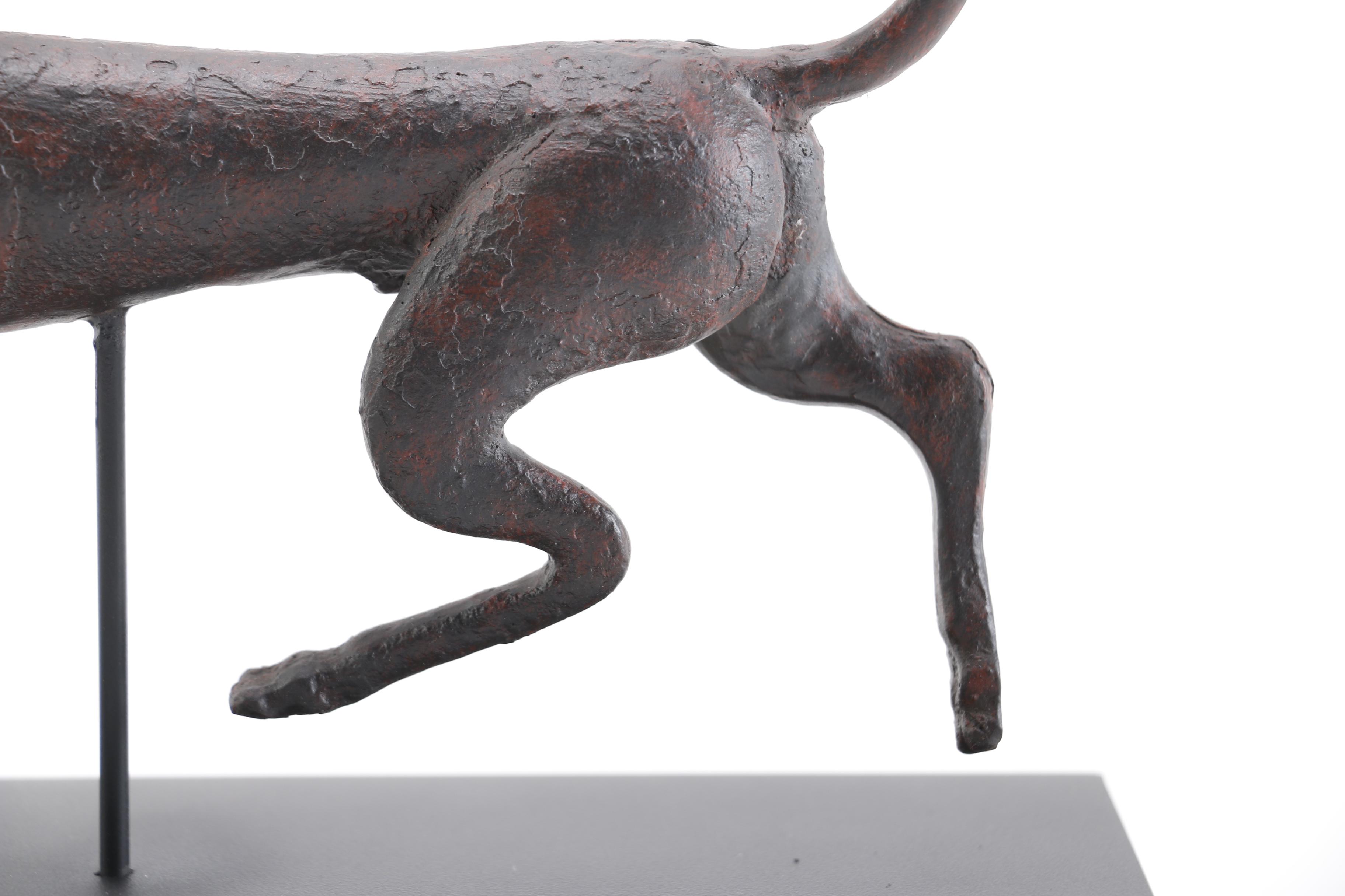 Cast Plaster Sculpture of a Running Greyhound