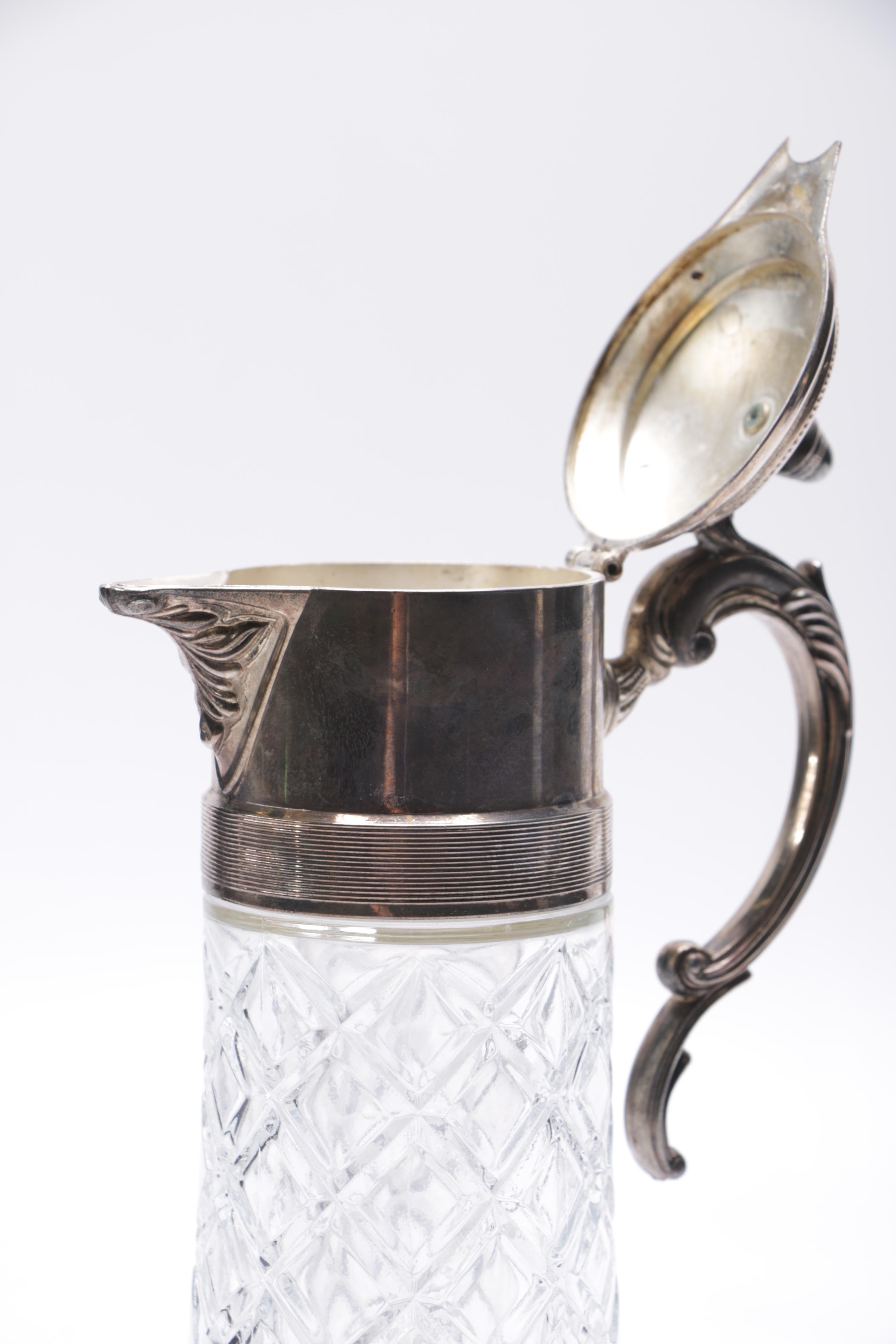Silver Plate and Cut Glass Pitchers