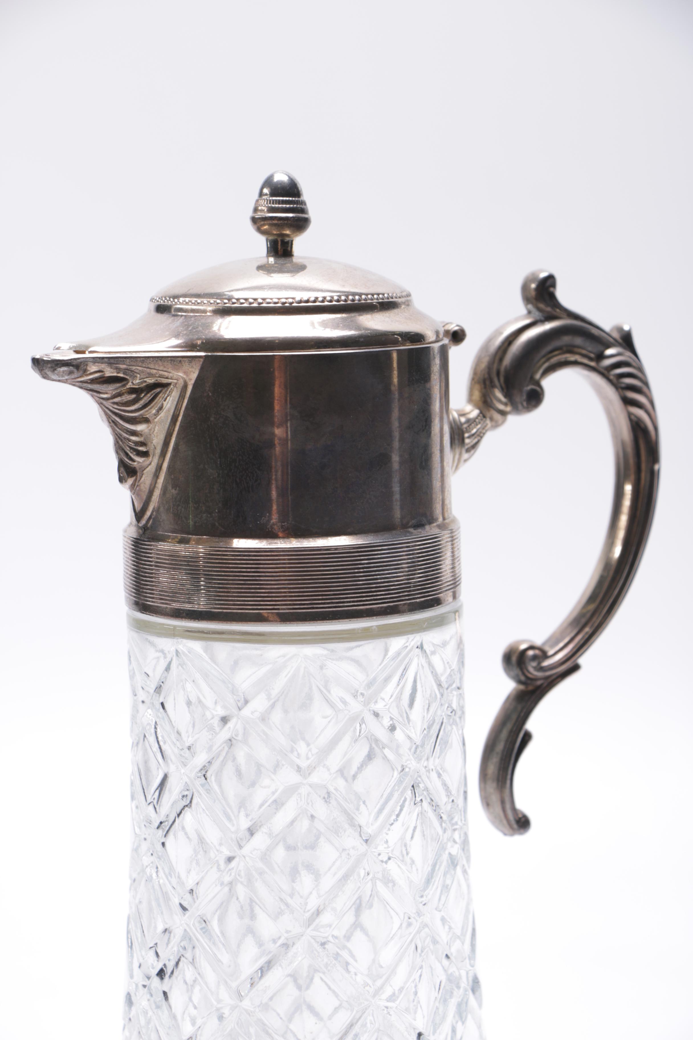 Silver Plate and Cut Glass Pitchers