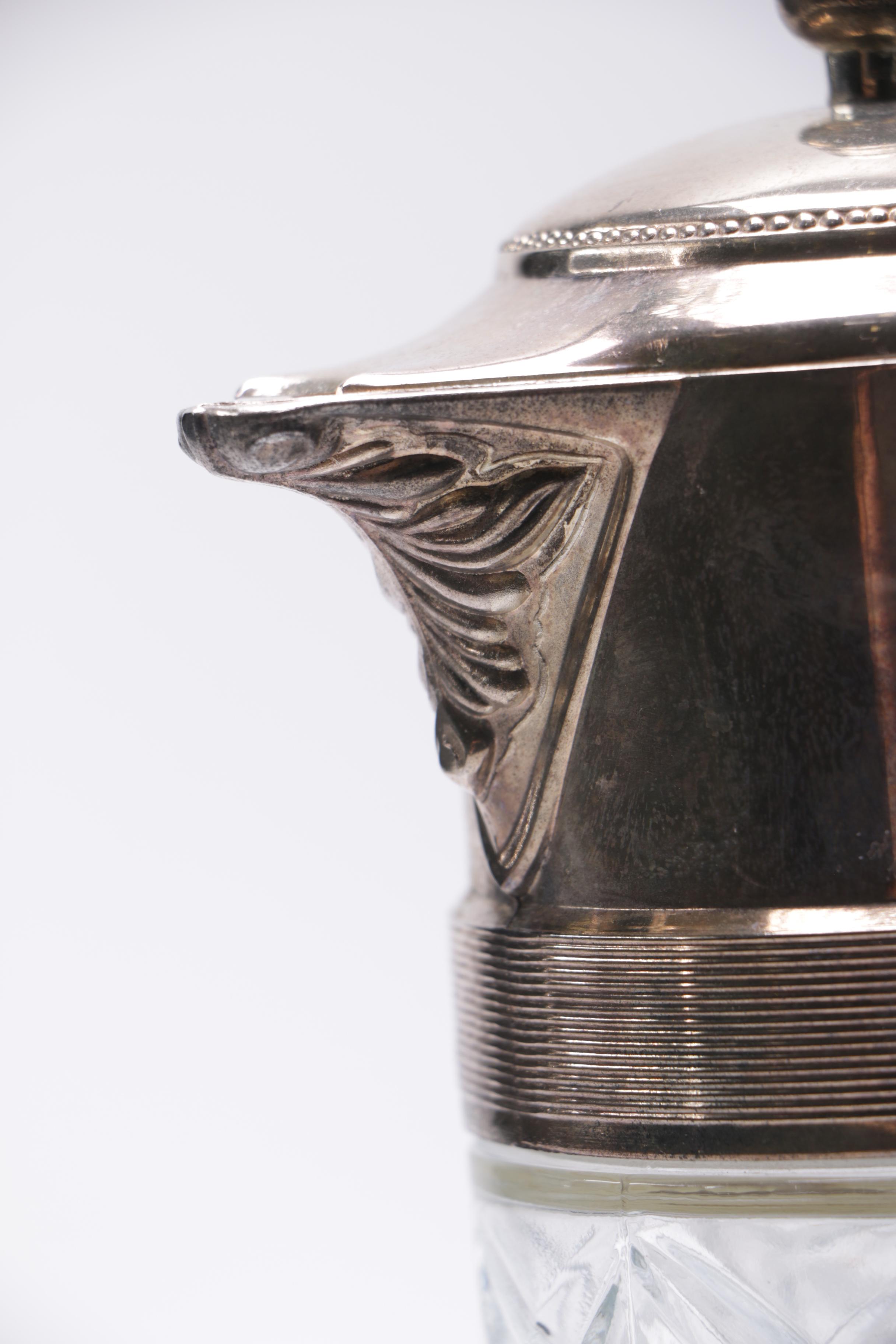 Silver Plate and Cut Glass Pitchers