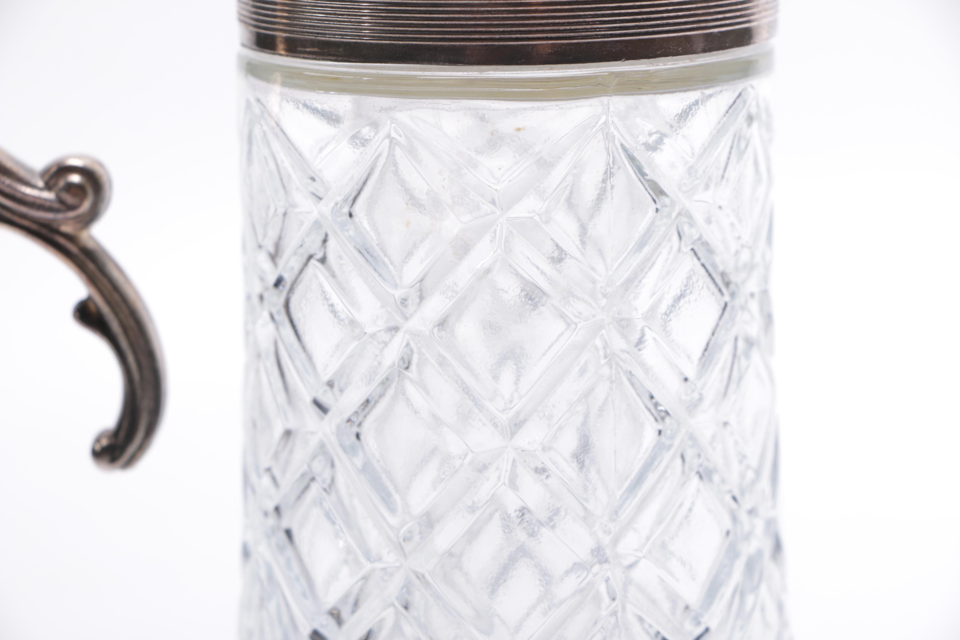 Silver Plate and Cut Glass Pitchers