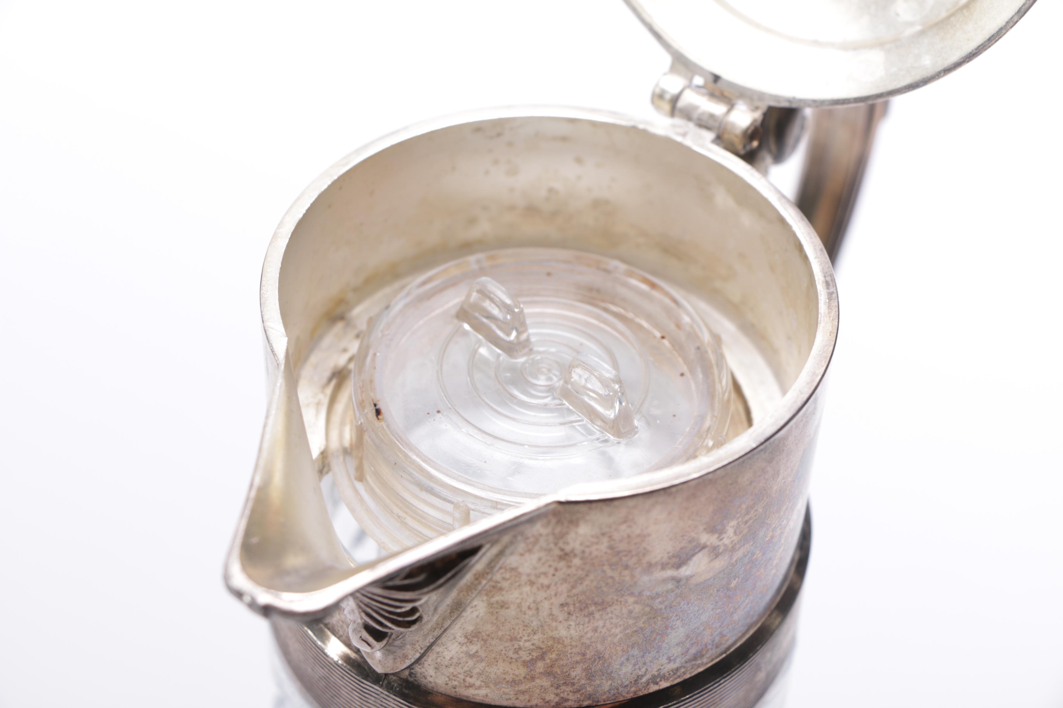 Silver Plate and Cut Glass Pitchers