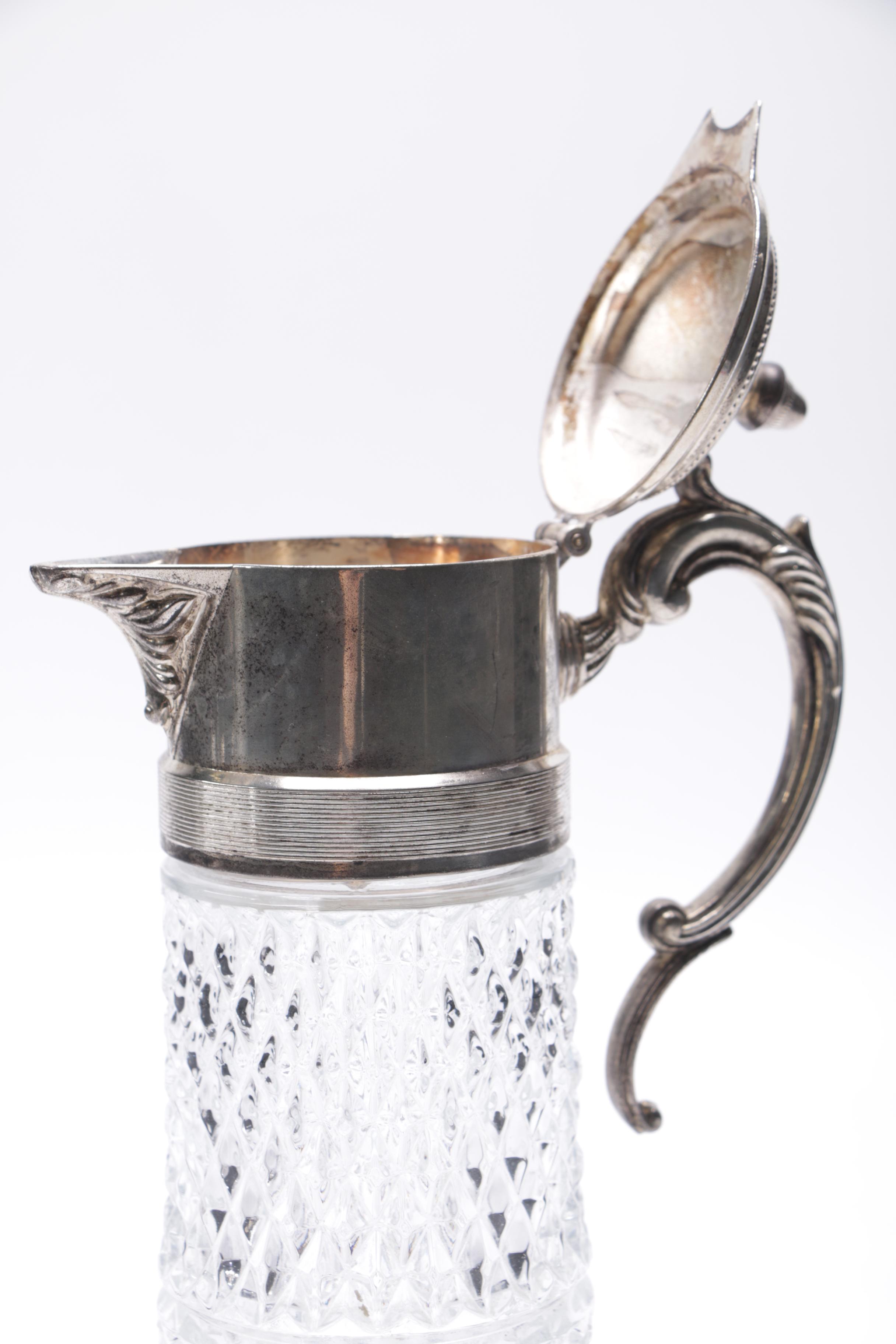 Silver Plate and Cut Glass Pitchers