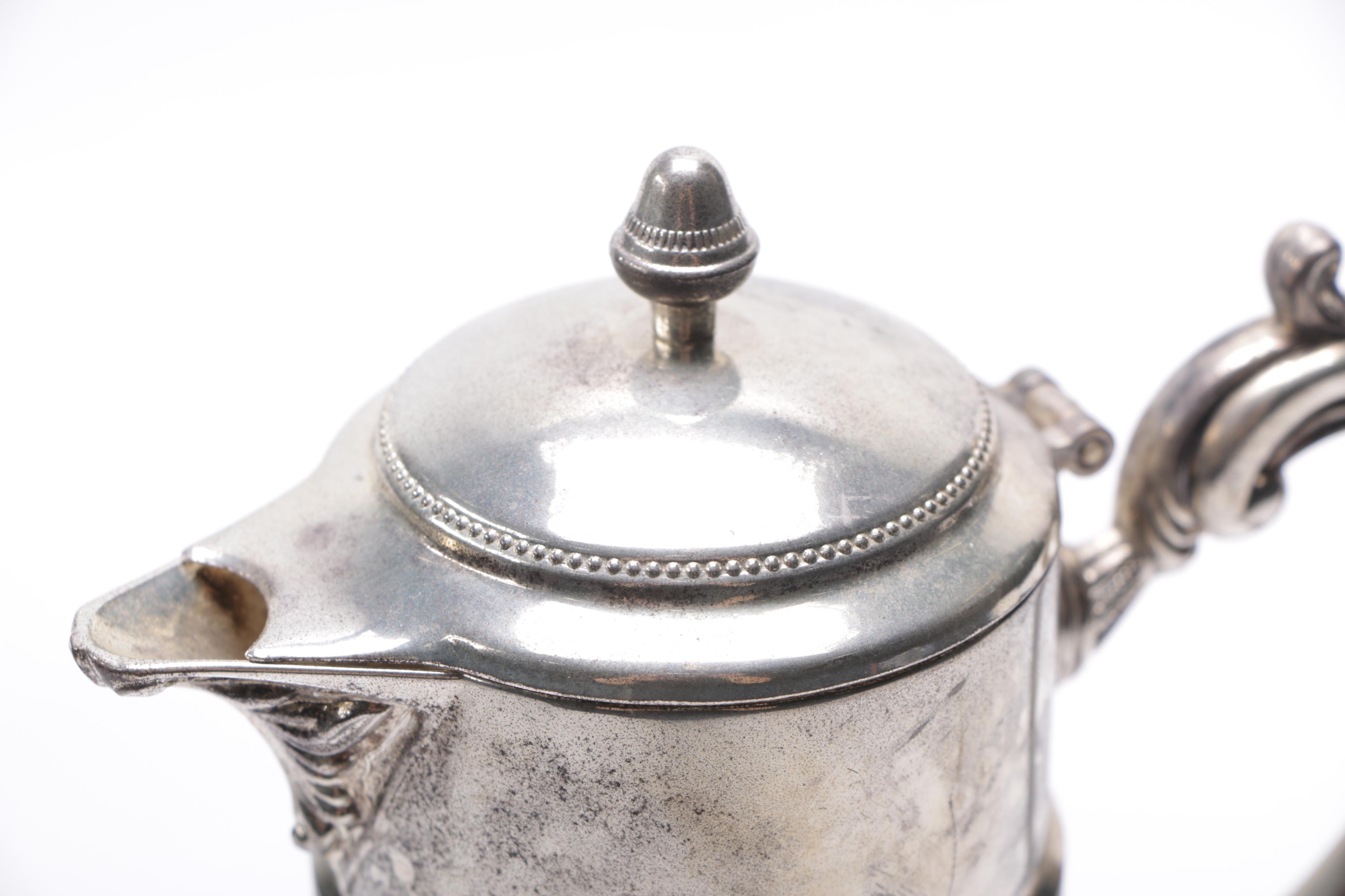 Silver Plate and Cut Glass Pitchers