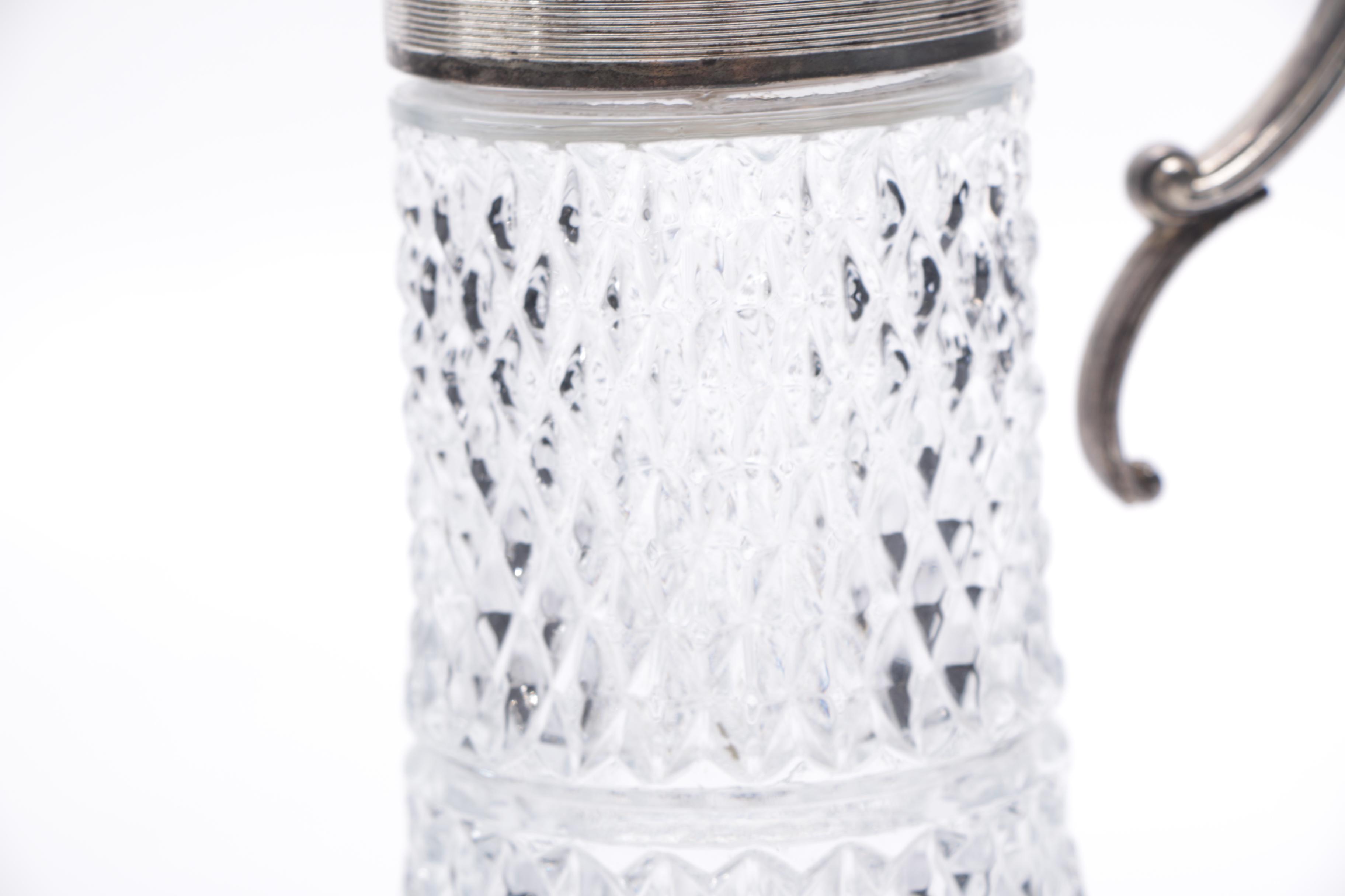 Silver Plate and Cut Glass Pitchers