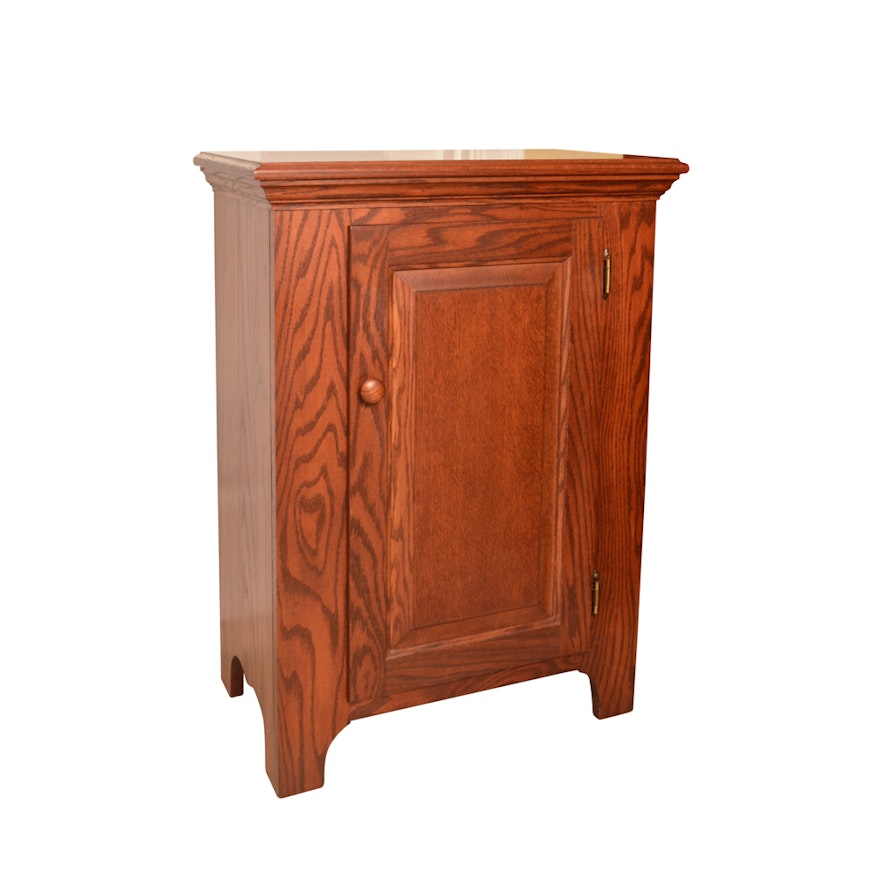 Oak Cabinet With Paneled Door