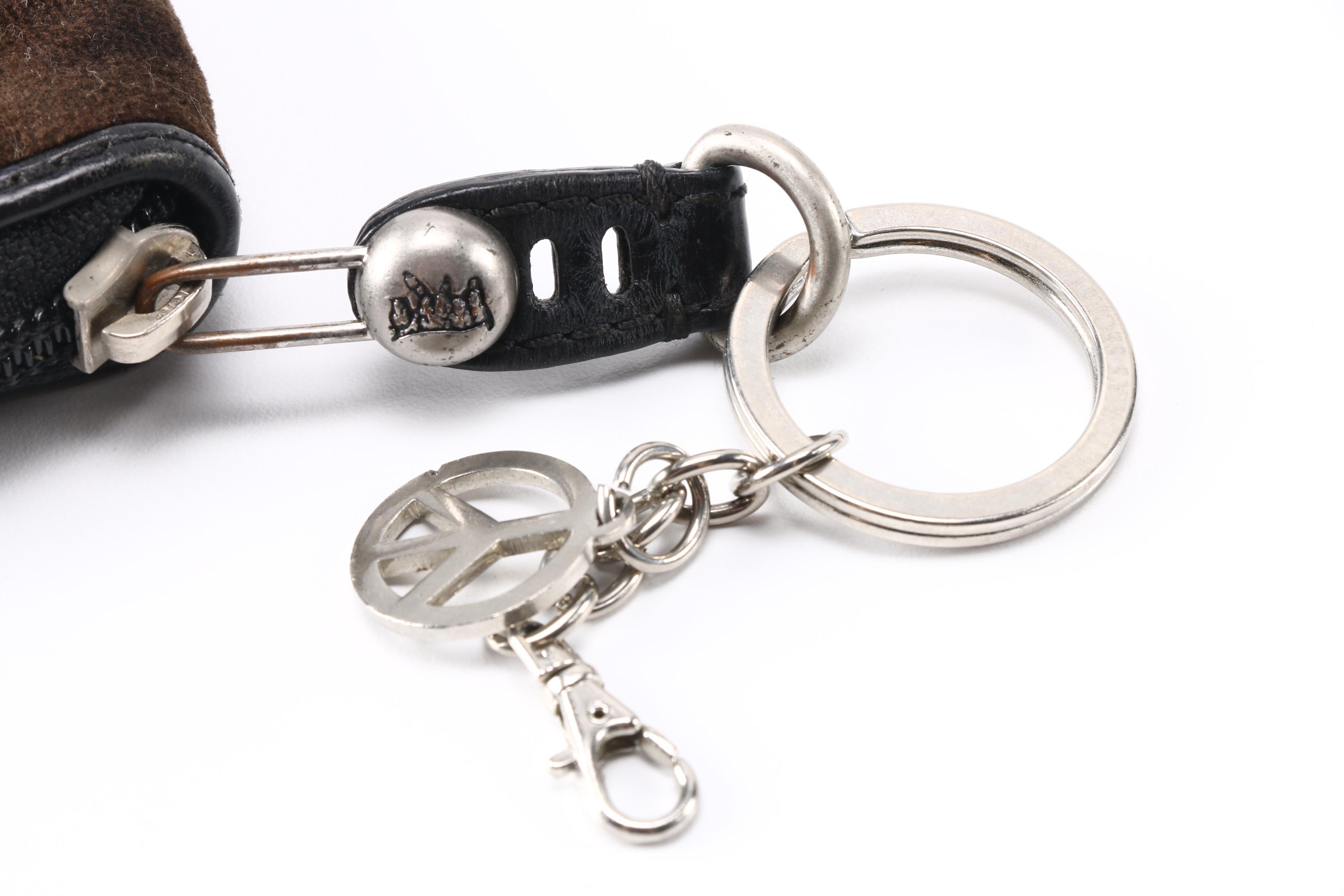 Pair of Brown and Pink Juicy Couture Wallets