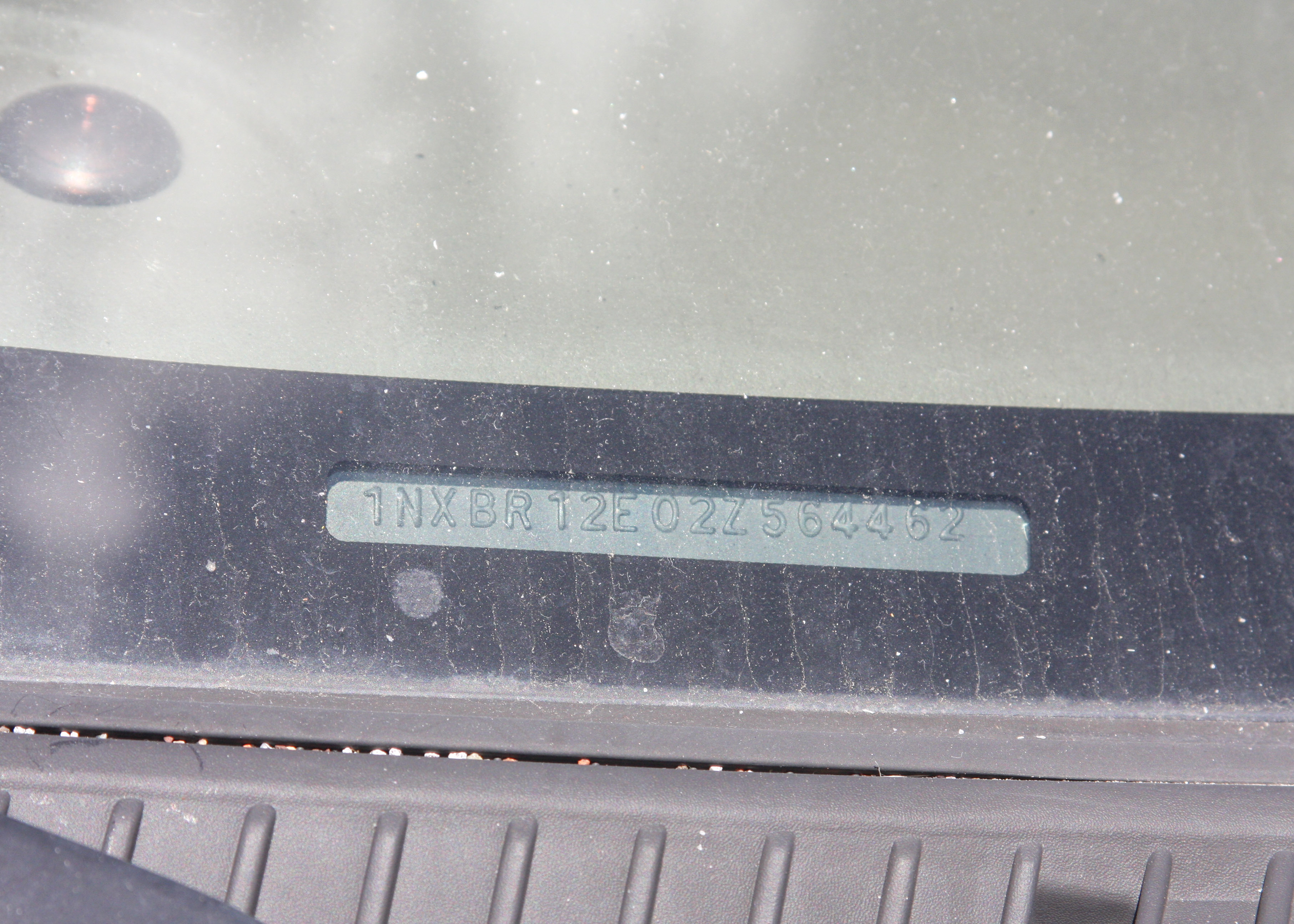 2002 White Toyota Corolla LE Sedan